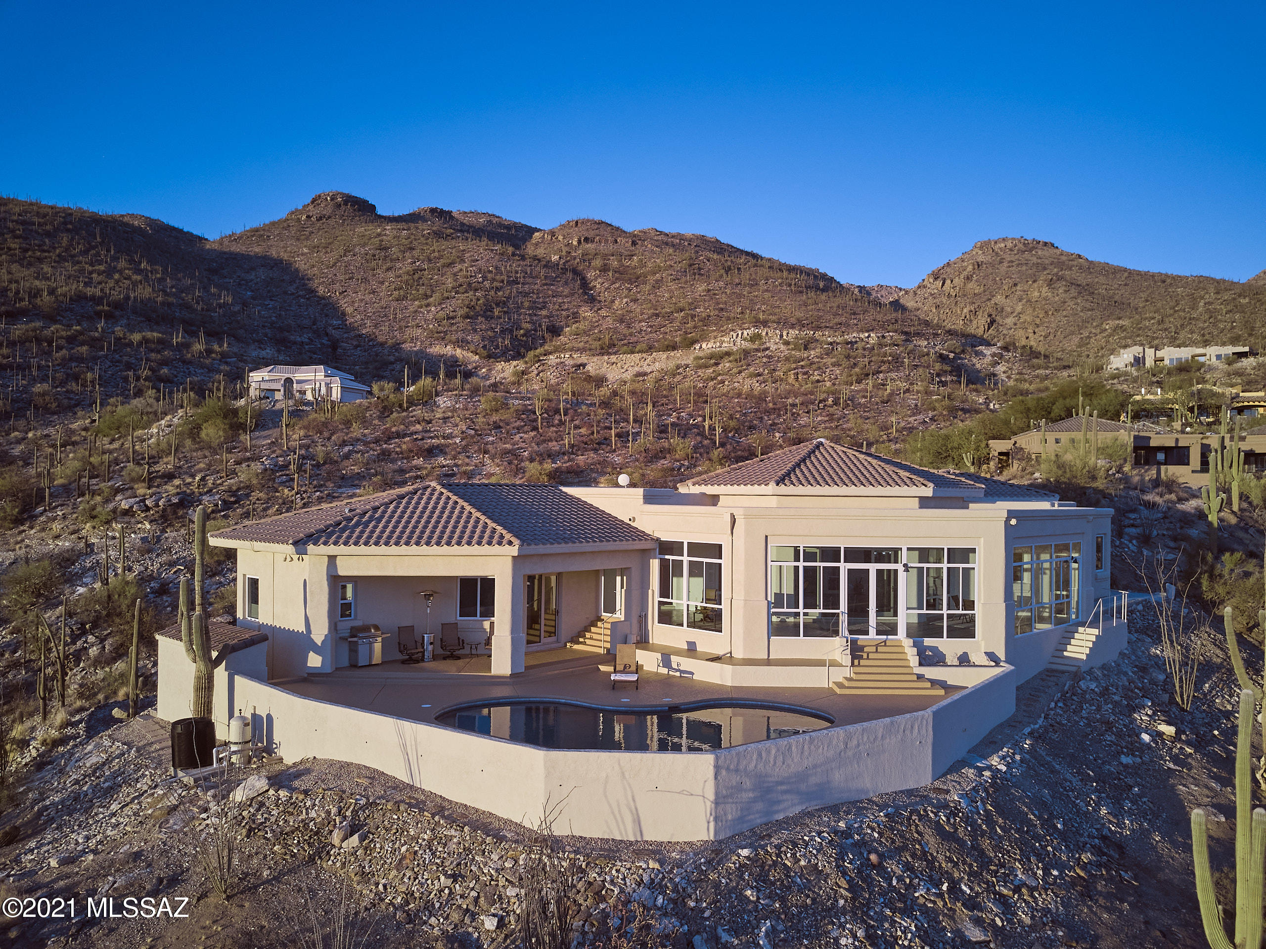 Range Priced from $975,000 to $1,075,000 Sellers will consider offers in this Range.
Breathtaking custom built home with 360 degree views of the entire Tucson valley. This 3 bedroom, 4 bath home is in immaculate condition and has pride written all over it. This home is in a great location, right off the base of Mount Lemmon. You will not want to miss this opportunity to own this beauty! Incredible Updates with Meticulous attention to detail..Schedule a showing today.