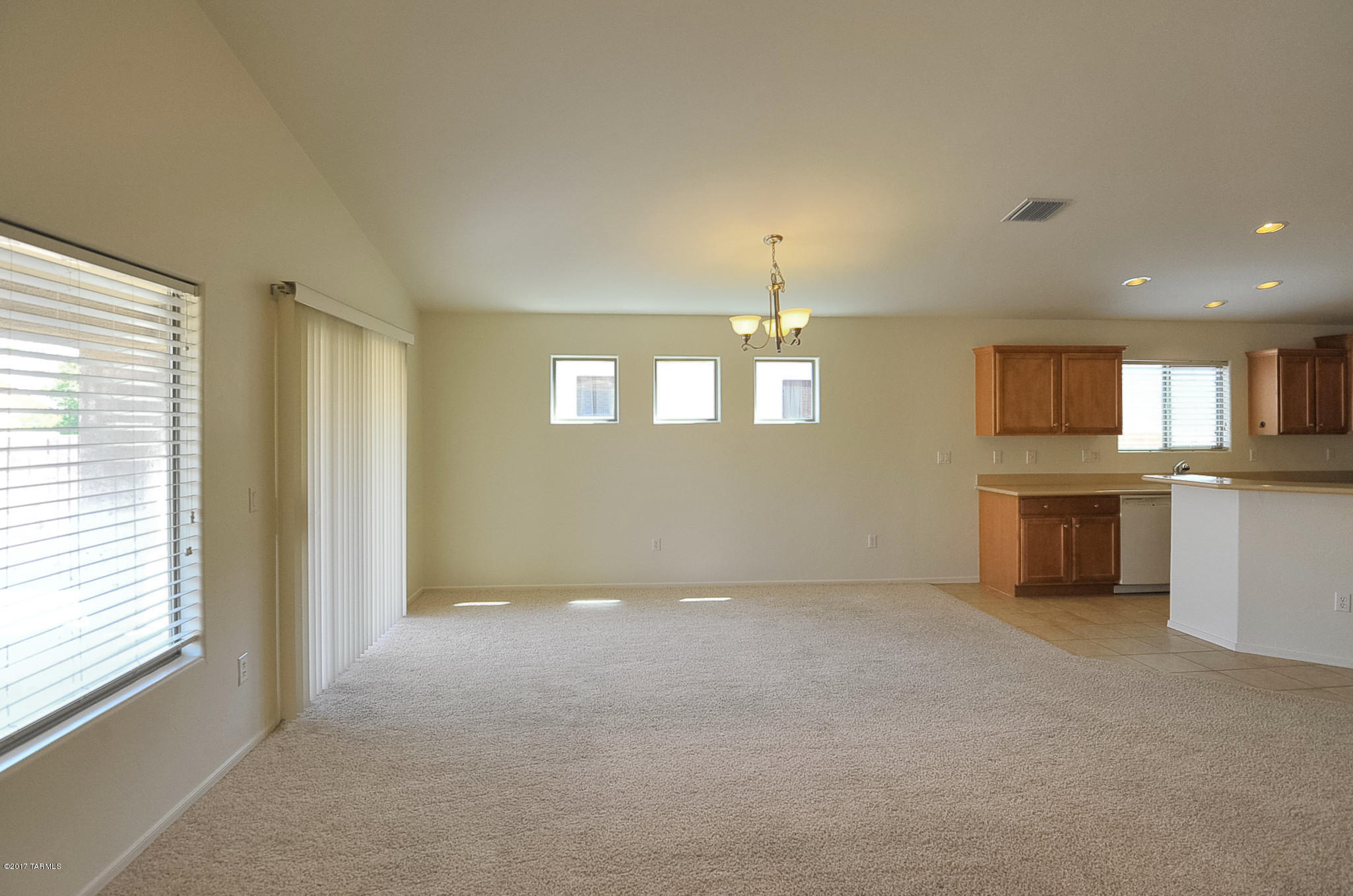 Beautiful 3 bedroom, 2 bath home in Valencia Reserve. Open and bright home with fresh paint, clean tile and carpets, Spacious open kitchen with loads of cabinets, breakfast bar or eat in area, plenty or room for entertaining, bisque colored appliances include side by side  refrigerator, microwave, oven dishwasher all opens to large great room.  Large pantry, split floor plan master has double vanities, separate tub/shower, large walk in closet, ceiling fan, laundry room with white washer/dryer , large covered rear private back yard, 2 car garage with door that leads to rear yard.  Close to DMAFB, Raytheon, Airport, easy access to I-10.  Subject to application process and credit approval.  This home has it. Ask about P#3190