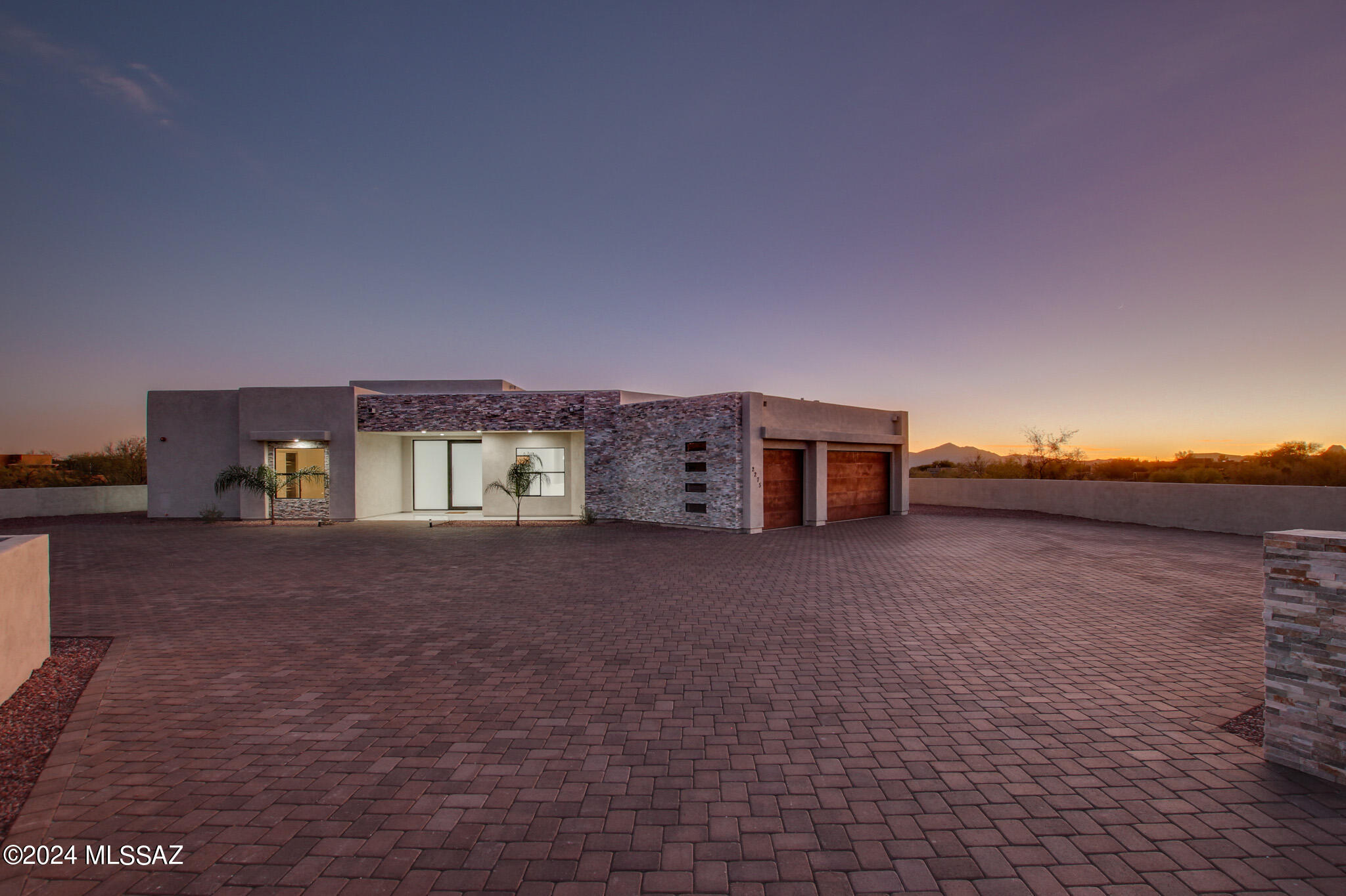 This newly built 4-bedroom, 4-bathroom masterpiece spans 3,100 square feet and offers a perfect blend of luxury and comfort. Mesmerizing mountain, city, and desert views surround this impeccable property. The kitchen is a chef's delight, featuring a beautiful large island and top-of-the-line Viking stainless steel appliances, including a gas stove and a convenient wine cooler. The thoughtful split bedroom floor plan ensures privacy for everyone, with each bedroom boasting its own in-suite bathroom. The primary bedroom is complete with a spacious walk-in closet, dual vanity, a luxurious jet tub, and a separate walk-in shower. Large laundry room equipped with a sink and ample storage space. 3-car epoxy garage adds a touch of practicality. Located close to shopping, restaurant and more!