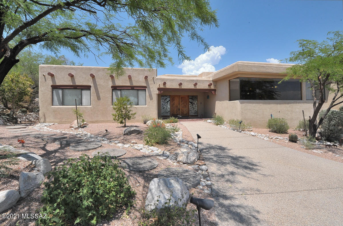 Stunning Views from this HILLTOP home nestled in the Foothills.  This 5BR/3BA, complete with all tile flooring, 3 fireplaces, pool and 3 car garage what more do you want. Built in 1994 oversized windows for enjoying the city and mountains views from every room.