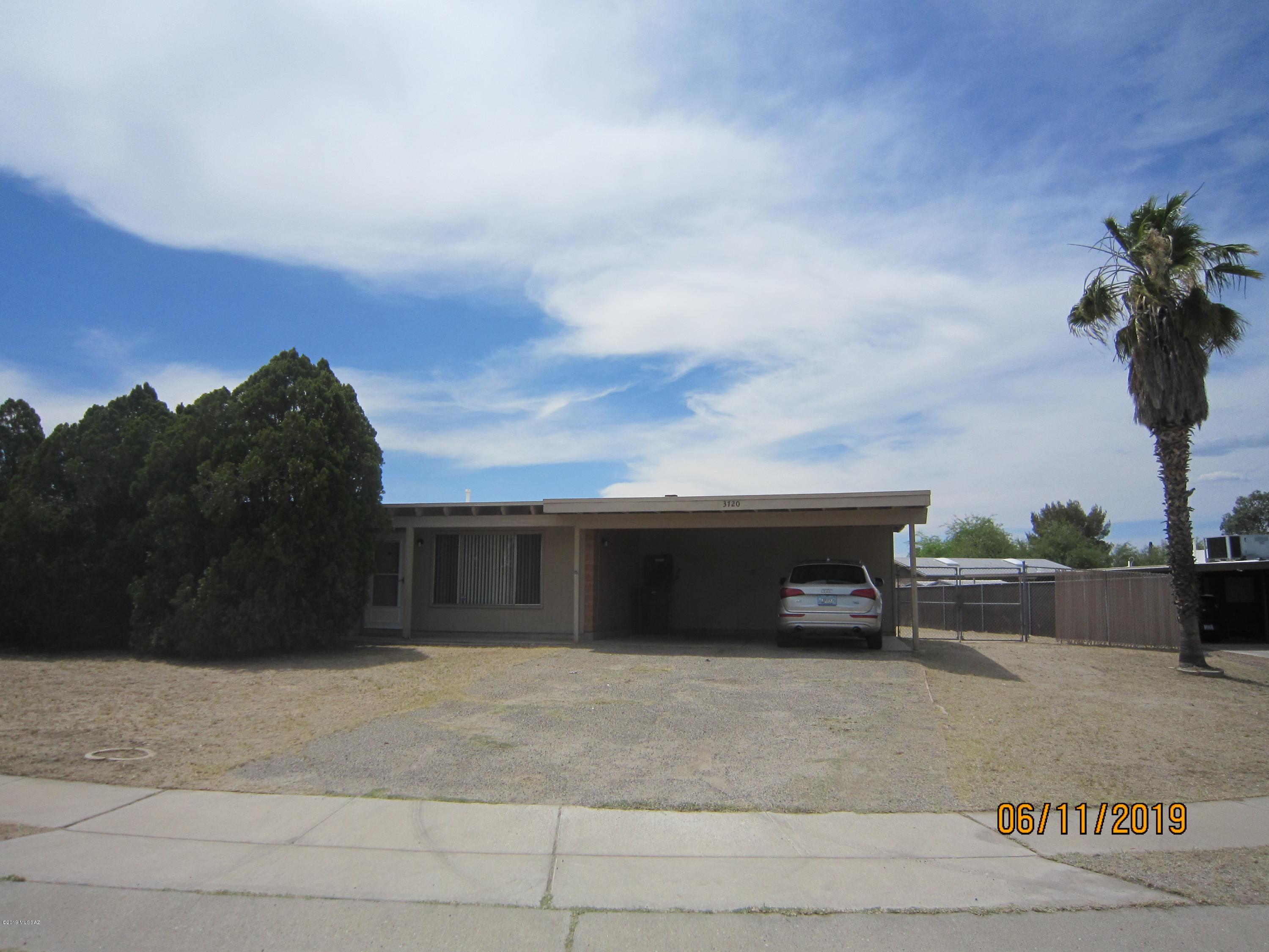 Spacious 3 Bdrm, 2 Bath House with Den, Central Air Conditioning, Large Fenced Rear Yard on Cul-de Sac! Huge Country Kitchen with Fireplace, Covered Patio in Rear Yard.  Den is open to Living Rm,  Ceiling Fans, Double Carport and Separate Storage Rm.