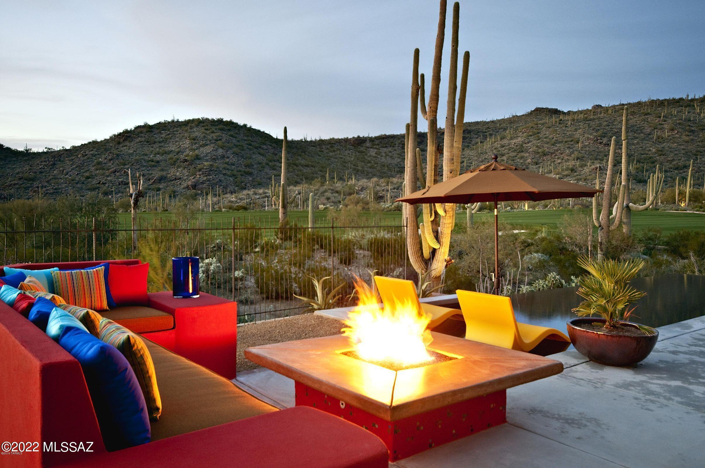 *ENCHANTING HACIENDA*  WONDERFUL BLEND OF ''CLASSIC'' SW DESIGN & ARCHITECTURE...COMBINED W/BREATHAKING UNOBSTRUCTED VIEWS OF GOLF COURSE/TORTOLITA MTNS MAKE THIS A TRUE PARADISE RETREAT! LUXURIOUS ''RITZ CARLTON RESIDENCE'' OFFERS FULL CONCIERGE SERVICES & ACCESS TO HOTEL POOL, FITNESS & GOLF MEMBERSHIP- W/VIP SERVICES AROUND THE WORLD! ELEGANT ''MODEL'' HOME BOASTS TONS OF UPGRADES & UNIQUE DESIGN FEATURES...CHARMING COURTYARD, GUEST CASITA, GATHERING RM W/MOTORIZED VANISHING DOORS, HARDWOOD FLRING/& RUSTIC BEAMS, DESERT TONES/TEXTURES, MEXICAN TILE & BRICK ACCENTS, GOURMET KIT- SUB ZERO/WOLF, CIRCULAR MORNING RM, *BONUS* OFFICE/LIBRARY! AMAZING BKYD OFFERS ''RESORT'' STYLE- INFINITY POOL OVERLOOKS DESERT/LUSH FAIRWAYS, BUILT IN BBQ, CHAT AREA W/FIREPIT - INCREDIBLE MTN & SUNSET VIEWS!