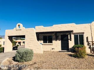 Well kept, updated town home located right in the heart of town! Updated kitchen, BRAND NEW carpet, Fresh interior and exterior paint, Roof coated last year, Updated AC unit, Newer laminate flooring, Energy efficient windows replaced two years ago. Move in Ready! HOA Dues include water, sewer, garbage, and all community maintenance. Perfect starter home at an amazing price! Close to shopping and parks. This wont last long!