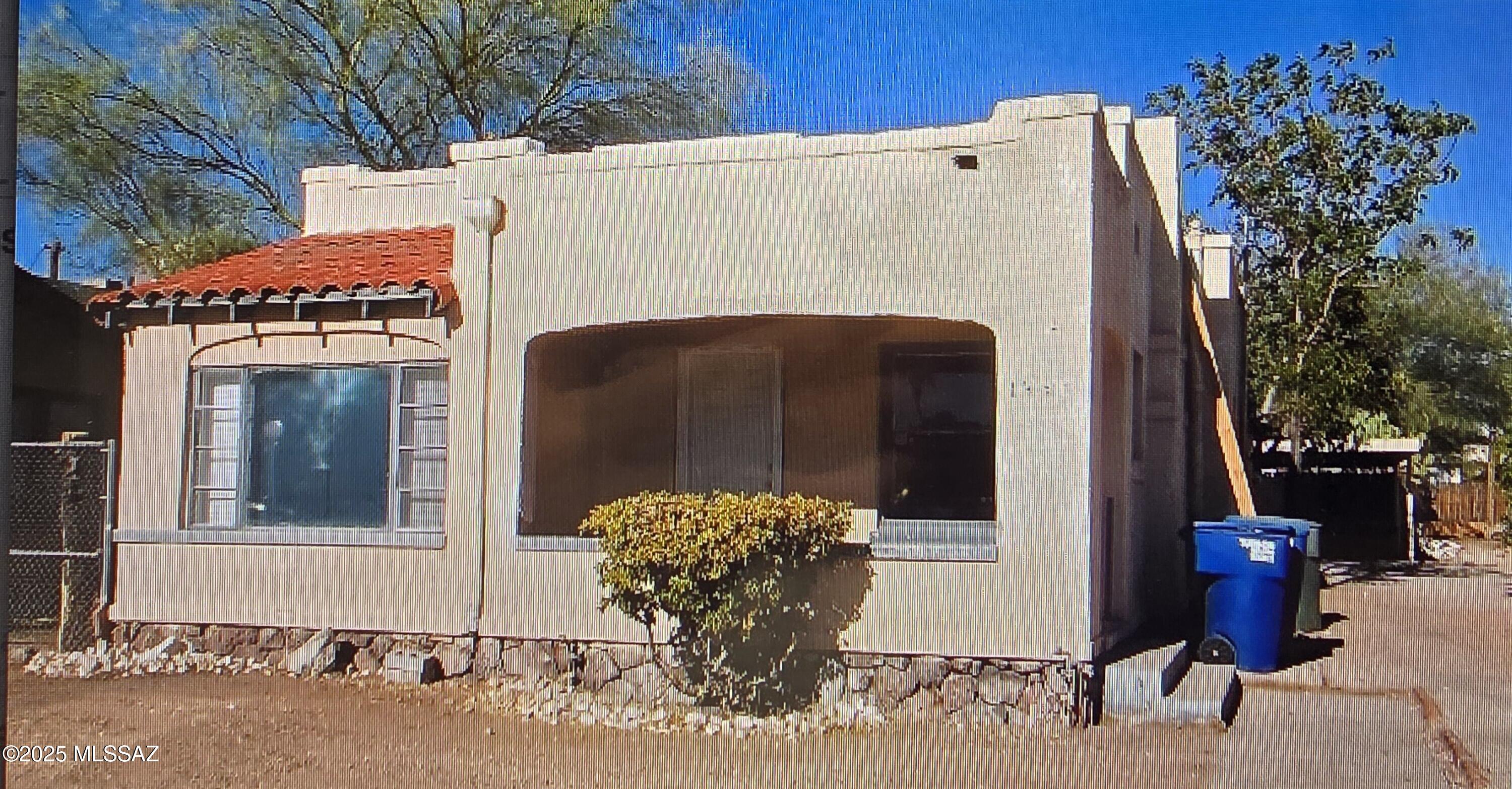 Charming 2 bedroom, 1 bathroom bungalow within walking distance of the U of A! Huge yard with fire pit and custom built grill! Large front porch. Original wood floors throughout most of the home. Evaporative Cooling. Great place to call home!