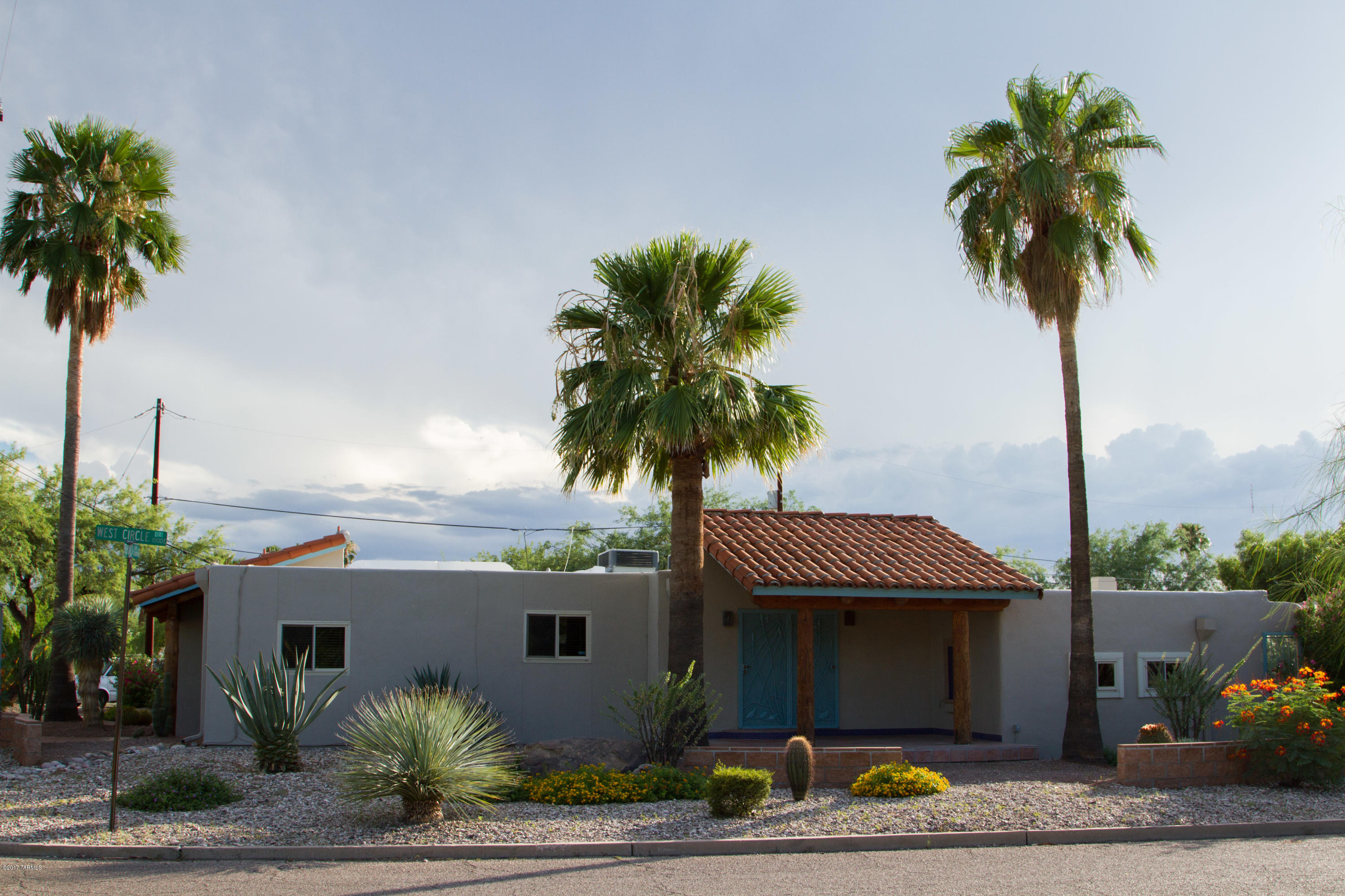 Move in ready classic, central charmer close to U of A, Salpointe Highschool, Mountain Ave Bike Path and
park! Updated with triple pane windows, remodeled bathrooms, new water heater in 2015, newer cooling and heating, Trane system, new washer and dryer. Meticulously
maintained home includes beautiful beamed ceilings, stone floors, extensive brick covered patios, custom outdoor fireplace & grill for entertaining!
Professionally landscaped and on drip irrigation. Abundant storage plus storage shed complete this lovely home. Great location close to shopping and dining! Neighborhood park, Mitchell Park just a short block to the north!