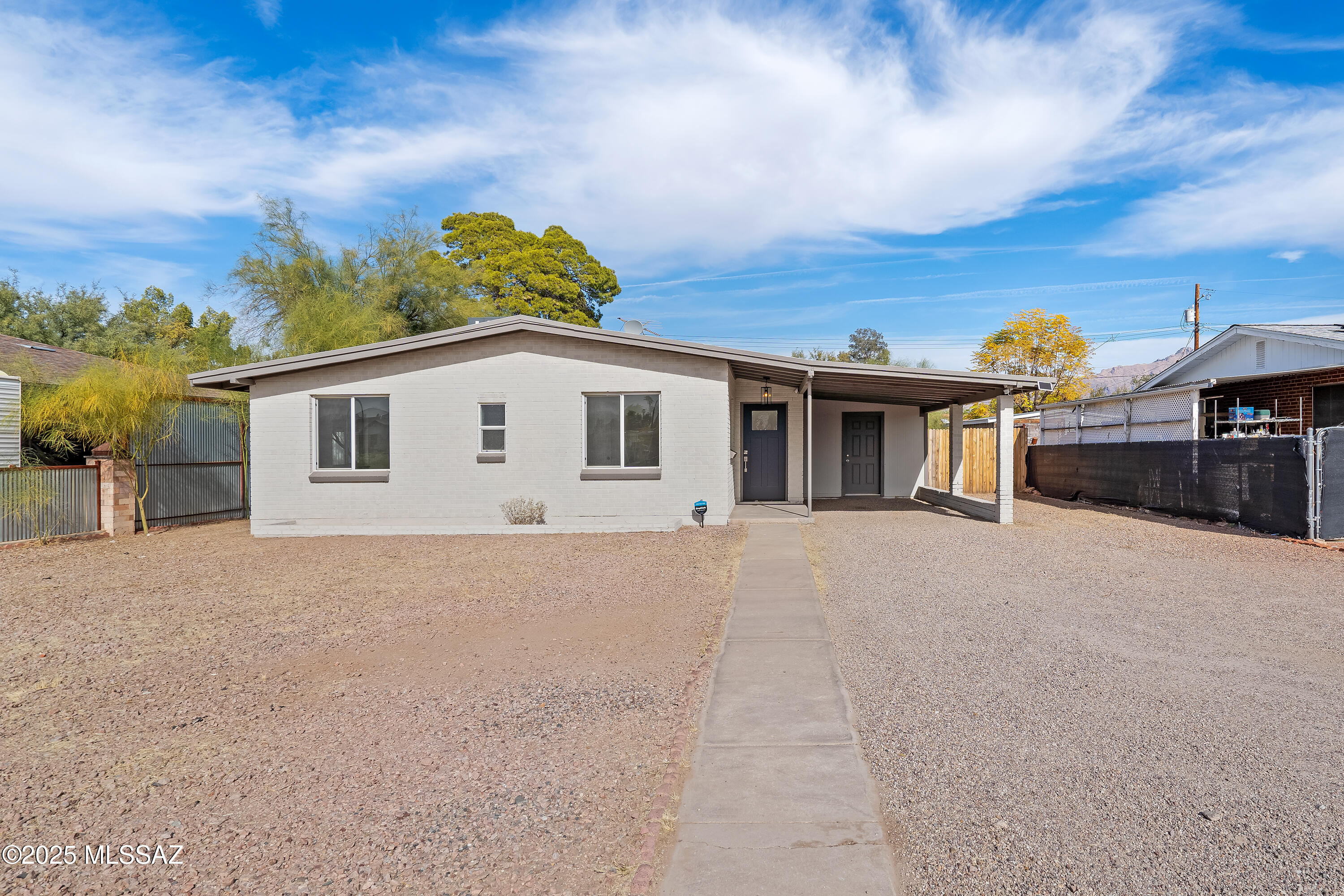 This beautifully remodeled bungalow in the heart of Midtown Tucson blends modern updates with timeless character. Offering 3 bedrooms and 2 full bathrooms, this home has been thoughtfully updated while preserving its original charm, featuring laminate floors, classic architectural details, and vintage touches that make it truly unique. The open-concept living and dining areas are flooded with natural light, creating a welcoming atmosphere for both relaxing and entertaining.

The kitchen boasts updated appliances, sleek countertops, and ample cabinetry—perfect for the home chef. The bathrooms have been tastefully renovated with stylish fixtures and finishes, providing a contemporary touch while maintaining the home's classic appeal. Step outside to discover a large backyard, where the possibilities are endless. A generously sized structure, already primed with electrical hookups, awaits your vision. This versatile space can easily be transformed into a private ADU (Accessory Dwelling Unit), studio, home office, or workshopperfect for creating additional living space or income potential.

Located in a prime Midtown Tucson location, this home is just minutes away from shopping, dining, and entertainment. With easy access to major roads and public transit, it offers both convenience and accessibility, making it an ideal spot to call home.

Don't miss out on the opportunity to own a piece of classic Tucson with all the modern conveniences. Schedule a showing today!