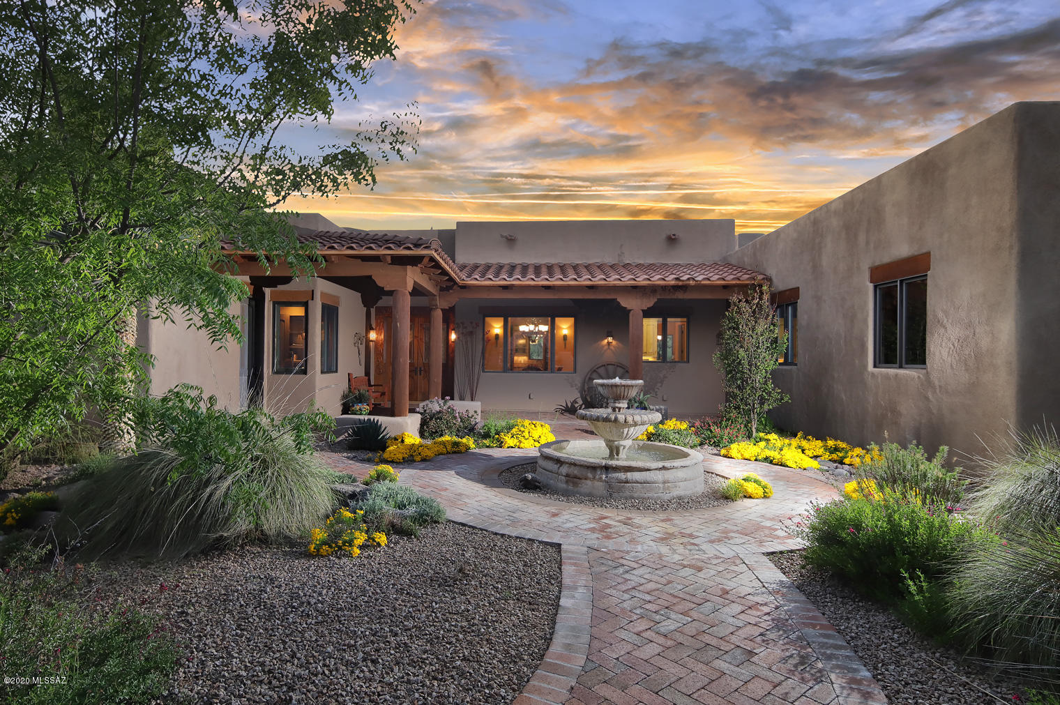 This Custom Built Craftsmanship Masterpiece Is Nestled on a Calmingly Quiet & Private Lot Nuzzled in a Mesquite Forest. Access to Tanque Verde Wash, Proximity to Colossal Cave & Saguaro East Bike Routes Make This Home Ideal if You Enjoy Cycling, Horse Back Riding or Have an RV. Wonderful Mountain Views are Easily Enjoyed from Covered Porch w/outdoor Kitchen. House Finishes Are Extraordinary– Hand-Laid, One-of-A-Kind Random Plank Mesquite & 15'' Satillo Tile Floors, Ceilings that Are Work of Art, Canadian Posts & Beams, Hand Crafted by Mexican Artisans Cedar Doors & Shelves, Exquisite Gourmet Kitchen w/LaCanche Gas Stove Imported from France. Master Suite w/Den and Two Walk-in Closets and List Goes on! 554 sq. ft. One Bdrm Guest House Allows for Graceful Family/Friends Hosting Or/Office.. "	Hand laid, one of a kind, random plank mesquite floors (appx. 2000 sq.ft)
"	15" custom made Satillo Tile  dried in the desert of Satillo with prints of the native desert animals (bobcats, coyotes, foxes) in kitchen and bathrooms
"	Every ceiling is a work of art
"	Canadian posts and beams
"	Exterior hand-carved doors & door surrounds by Mexican artisans
"	Hand crafted bathroom cabinet doors 
"	Hand crafted with Mexican cedar interior doors, bookshelves and territorial window shades 
"	3 solid masonry fireplaces inside plus one outdoor fireplace, done by master stone masons of a caliber you will not find today
"	Three leaded stained glass windows by acclaimed local artist Patty Johnson  front, rear and dining room doors
"	8" cedar doors/bookcases
"	Oversized Windsor windows 

"	Gourmet kitchen 
o	Granite kitchen center island overflowing with garnets
o	La Canche gas stove (both gas & electric ovens) imported from France
o	Vintage inset cabinetry  kitchen & laundry room
o	Granite countertops

"	Master suite with -
o	Two walk-in closets 
o	Master closet built-ins with aromatic cedar-lined drawer
o	Claw foot soaking tub with separate shower 
o	Dual vanities
o	Cantera stone accent fireplace
o	Den /office
o	Screened-in porch

"	Built-in home theater 
o	Home Theater wall between Home Theater and Master bedroom is insulated with a sound board

"	Built in safe
"	High ceilings
"	HVAC units are 18 SEER
"	9" post tension slab foundation
"	Generous size storage room in the garage






OUTSIDE AND MORE

"	Magnificent Catalina mountain views from the North porch
"	Wonderful Rincon mountain views from the East side of the house
"	Extraordinary privacy  the property is very secluded
"	Zoned equestrian  horse property
"	Perfect for horse riders - Tanque Verde Wash is adjacent to the property
"	Extensive covered North porch
"	Guest house 
o	554 sq.ft
o	one bedroom 
o	kitchenette
o	two carport guest parking
o	RV space 
"	Water, 50 amp electric  full hook ups for large RV 
"	City water and private well, plumbed to switch either way  11 gal/min well with 1,700 gal. Cistern, re-ionized for city water
"	Exquisite details overseen & directed by celebrated & published landscape/architectural designed Penny Pederson  her Mexican, Indian and desert influence is unrivaled.
o	Extensive irrigation system
"	Solid masonry built-in BBQ/outdoor kitchen 
"	About 8000 sq.ft. under the roof space to include living areas, massive porches, garage and storage rooms.
"	3 car garage with 1165 sq.ft of garage space and generous size storage room
"	Two fountains
"	Above-ground built-in hot tub with masonry steps & decorative tile accents, surrounded by lush desert with mountain views
"	9" post tension slab foundation
"	Perfect for cyclists as very close to The Loop, Colossal Cave, Saguaro National Park
"	Less then three miles from soon to be Tucson Bike Ranch Resort  reference Bike Ranch 49 units facility  read https://bikeranch.com
"	Within short drive from amenities to include shopping, dining and medical facilities
"	Recent property survey copy is available
"	Plumbed for a pool