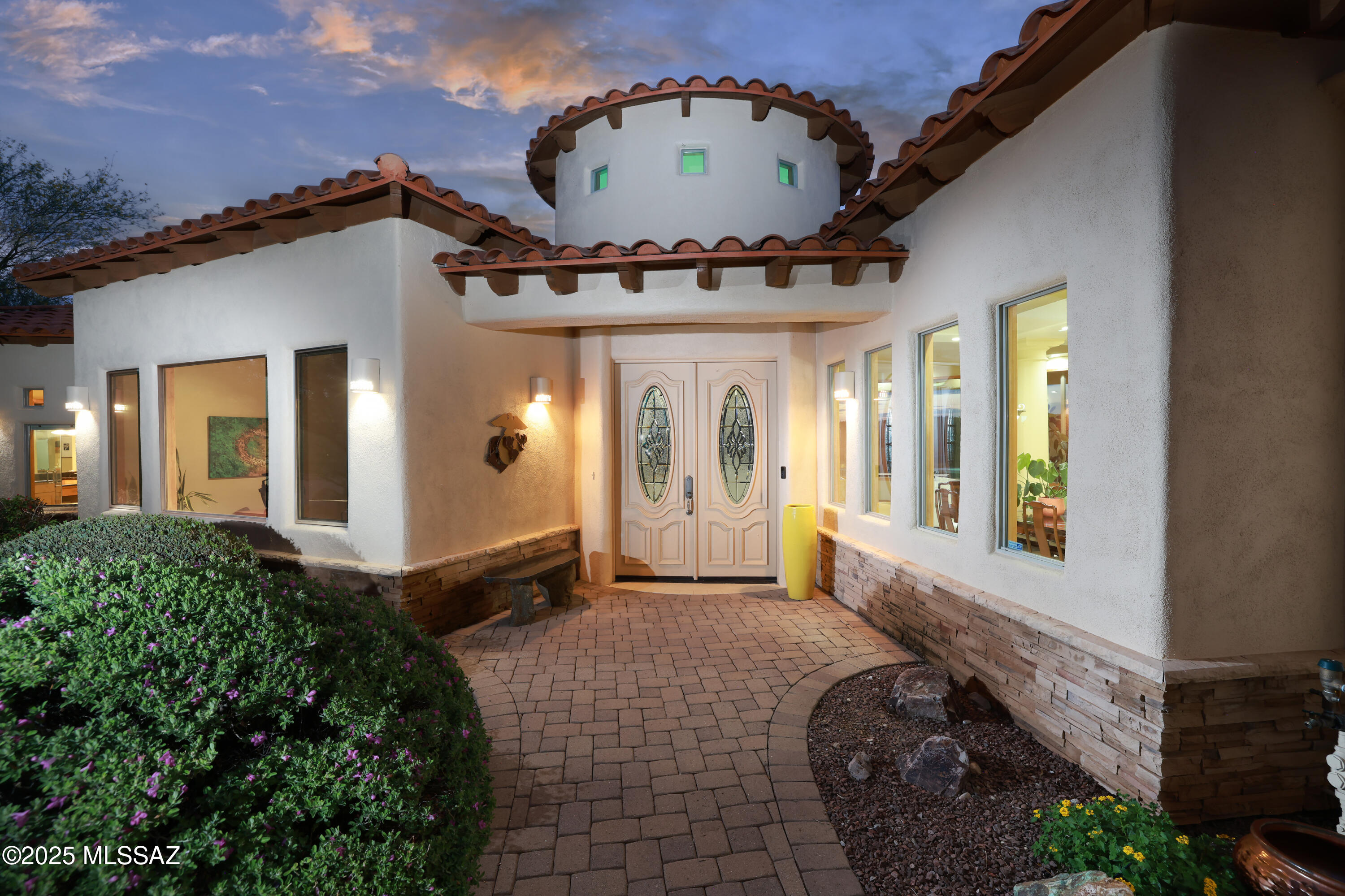 Nowhere in Tucson can you find a more perfect location surrounded by majestic mountains, nature, sparkling stars, sunrise sunset, green fairways and ample desert animals than Starr Pass.  Yet, you are literally minutes away from a vibrant downtown, cultural events, shopping, UofA, Raytheon, and multiple executive employment centers.  This executive home has more than most,  4 bedrooms 3 with private baths, a half bath, a luxury walk around kitchen, the great room the second you walk you you are drawn to universal views of the back yard, pool, panoramic mountains and vistas, it is jaw dropping beautiful.  The great room is so inviting with views, open space multiple ceiling heights architectural flair and adjacent to a large dining environment.  Elegant modern comfortable - yours! Outdoor living with fabulous pool, spa, waterfall lay back and watch the stars.  Let us also embrace Starr Pass is the home of the JW Marriott Starr Pass Resort and The Club at Starr Pass a 27 hole championship golf environment.  Memberships are very affordable and provide a variety of entertainment.  Starr Pass is studied by the Urban land institute and embraced by the audubon society. Nestled by the Tucson Mountain Park with hiking and biking trails.  You will love being here and this home is perfect and maintained to the highest standards
