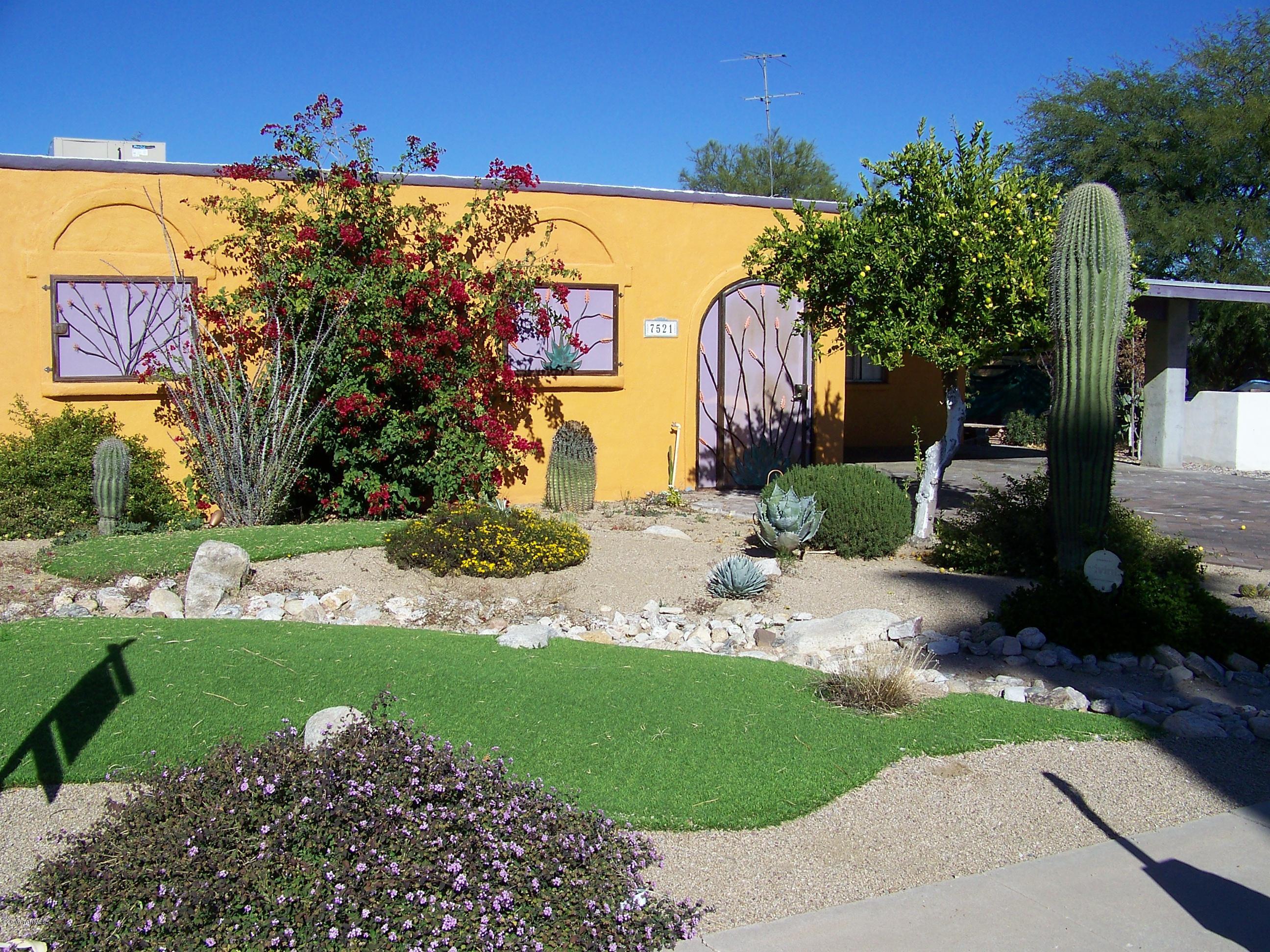 Quiet cul de sac location! Charming territorial exterior with a SW flair. Enjoy the spacious eat in kitchen with abundant cabinetry. Living room has a beehive fireplace. Family room addition has lots of windows and light. (not included in SF)Multiple covered patios and attractive landscaping. With a little paint and elbow grease you can make this a stunning home.  Pool is severely damaged! Home is sold AS IS!