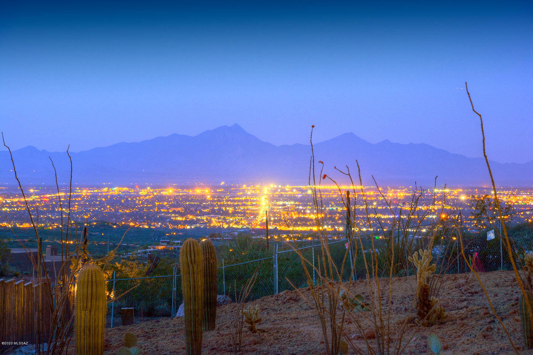 Outstanding, brand new contemporary-style home in prestigious, gated Finisterra.  Stunning does not being to describe this 6 bedroom, 5 ½ bath, 6,000 sq. ft. masterpiece at the top of a ridge, at the end of a cul-de-sac, on a 2.16 acre lot with privacy, sweeping Ventana Canyon, Catalina and Rincon mountain and Tucson city views.  Paver driveway leads to custom wrought iron entry door into living room/dining room with soaring ceilings, walls of windows, custom light fixtures, natural stone floors and alder wood doors throughout. Family room and chef's kitchen offer granite counters, SS designer appliances, oversized center island and custom cabinetry. The home is currently under construction and will be completed soon, buy now and select some of your own finishes.