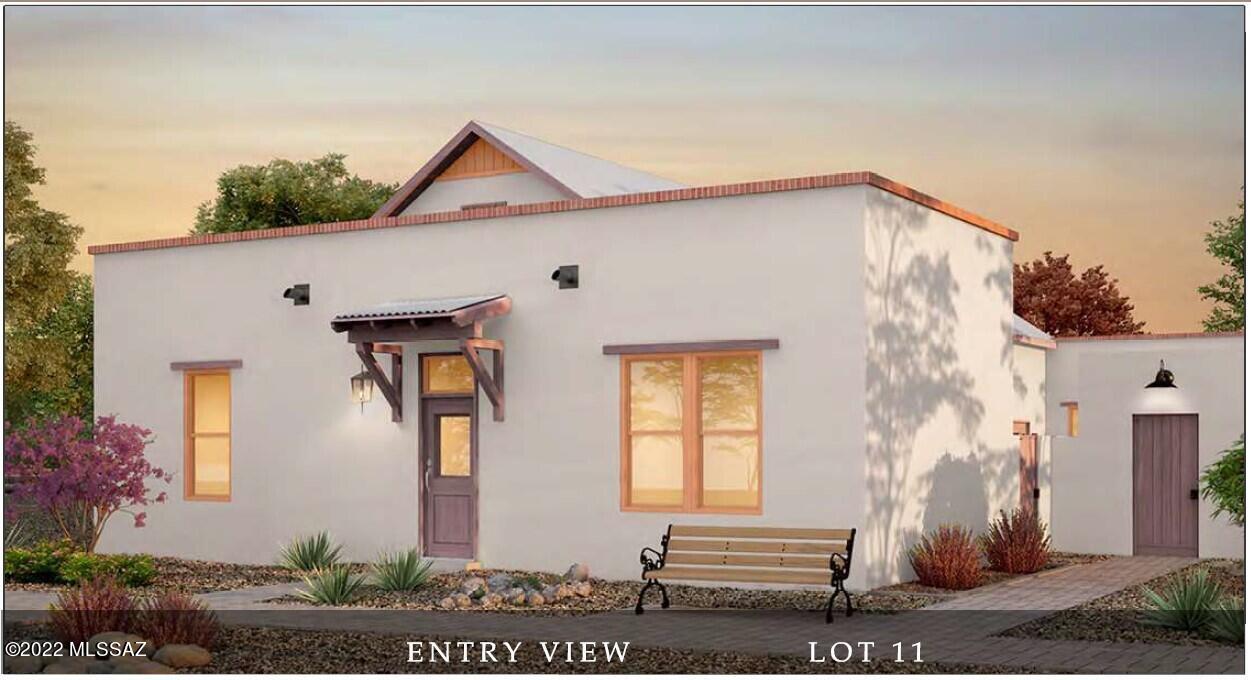 Rare opportunity to own a newly constructed masonry home in the heart of Tucson's Barrio Viejo. This historic style patio home is a 5-minute walk to the center of downtown, its restaurants and entertainment. Just a 2 minute walk to Tucson Convention Center where you can quickly access the Streetcar. You will also have quick access to I-10 and the Santa Cruz River Park and The Loop. This home features a first floor master bedroom, spacious open great room, colored concrete flooring and 2 additional bedrooms in the cleverly concealed second floor. Outdoor living and entertaining can be enjoyed on your private pavered courtyard. This energy efficient home comes with a 16 SEER HVAC system and a 10-year builder limited warranty.