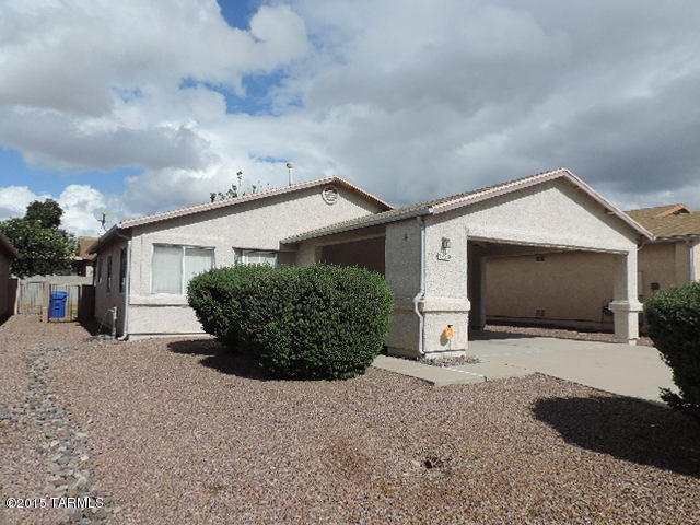 Here is your opportunity to own this move in ready 2 bedroom, 2 bath, bright and open single story home. Relax in your fully fenced backyard with covered patio, keep cool with the new A/C. All appliances stay. Easy access to I-10, close to shopping, schools and parks. Whether you are a first time buyer, or looking for a retirement home, this is a must see.