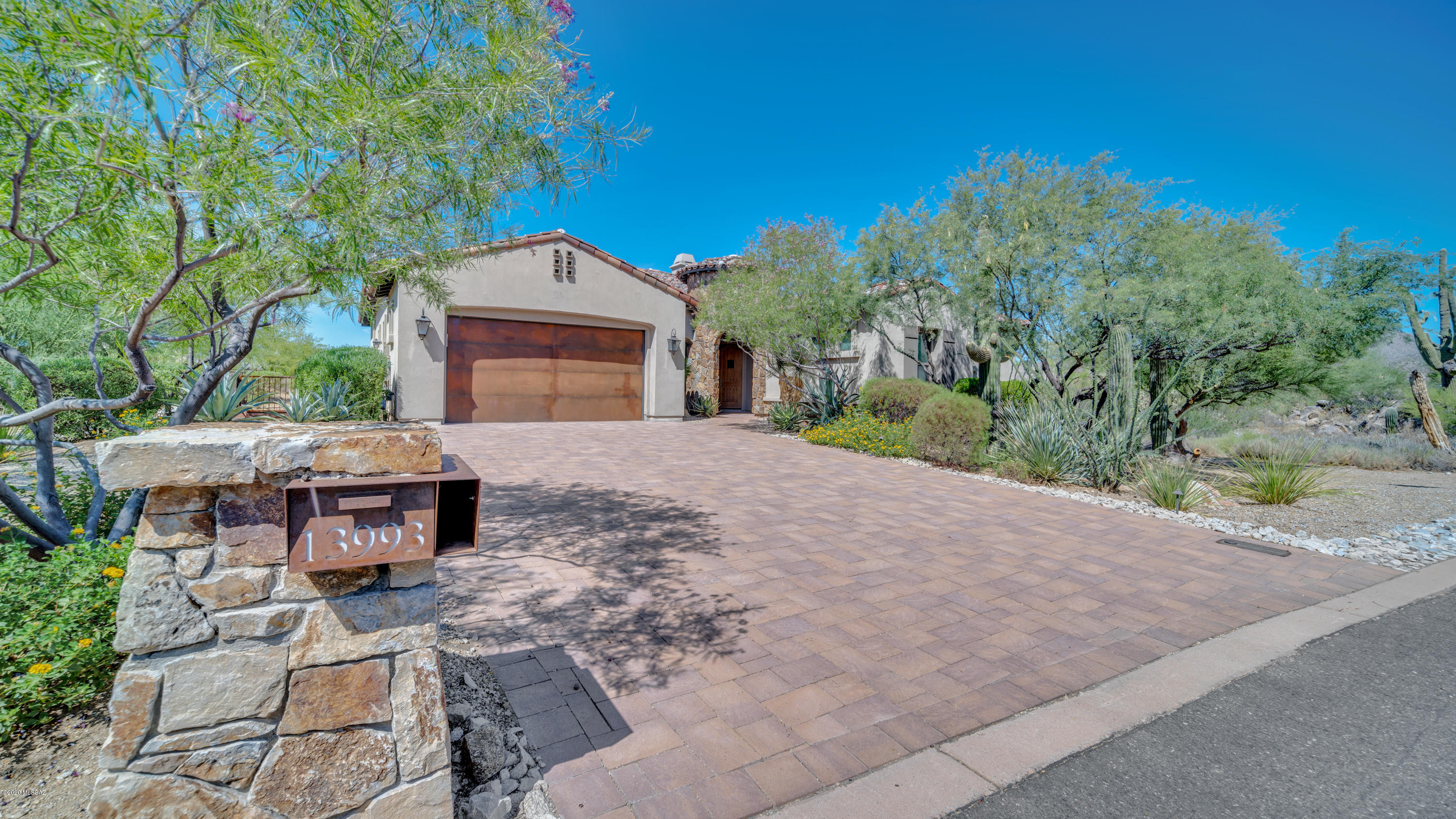 Luxury living in guard gated Stone Canyon. TURNKEY, fully furnished and ready to go. This 3 Bd/3 BA/DEN sits on over 1 private Acre.  Luxurious great room, formal dining area, kitchen w/ granite slab bar/island. All Kitchen Aid stainless appl, incl 6 burner gas cooktop w/ soaring range hood. Nearby butler's pantry & roomy walk in pantry.  Breakfast area near (3) panel sliding door that opens to peaceful desert views. Great room enhanced w/ coffered ceiling, gas frpl.  Dble door entry to den. Laundry w/ sink, cabs, storage closet. Master suite w/ stunning views, patio access, long dual vanity, 3 head walk in shower, spacious closet.  BR 2 features en suite bath w/ large shower, walk in closet. BR 3 has walk in closet. Hall bath w/ shower. Covered, open & raised patio areas w/ TV. Paradise !