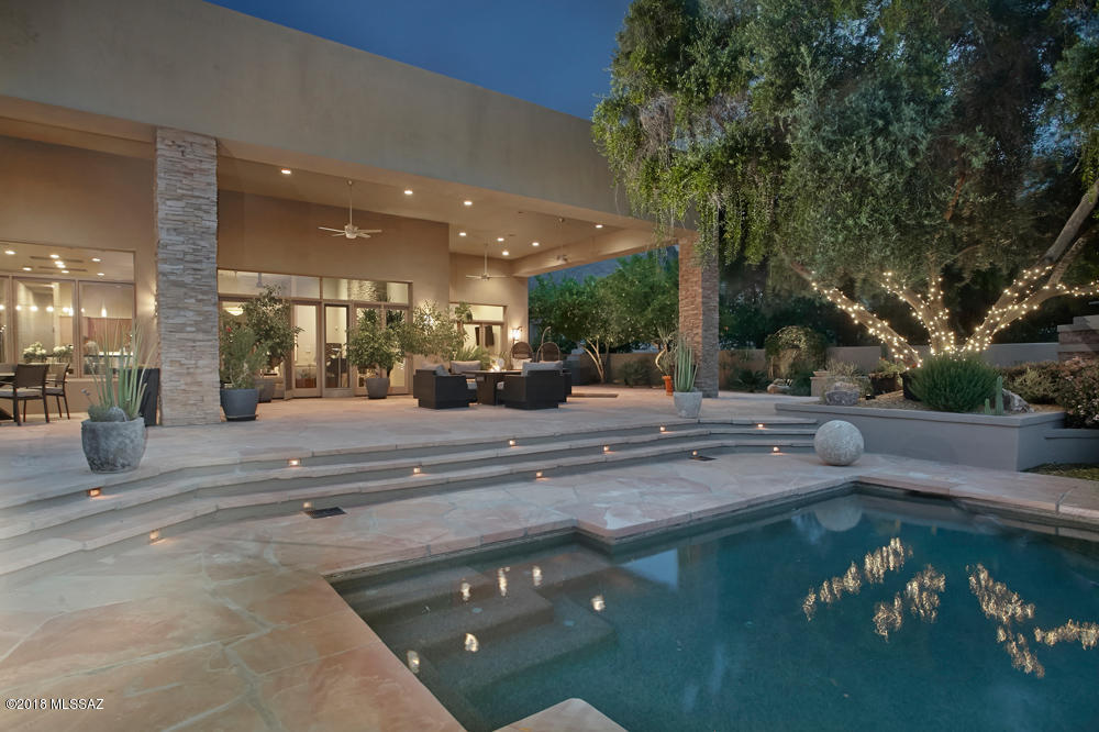 TIMELESS, GRAND AND UNDERSTATED. COMFORTABLE CONTEMPORARY WITH SOARING CEILINGS AND WALL OF WINDOWS OVERLOOKING MOST GORGEOUS BACK PATIO AND MTS BEYOND  IN ALL OF VENTANA.. SET WELL OFF THE STREET AT END OF QUIET CUL DE SAC ON ONE OF THE LARGEST LOTS IN THE NEIGHBORHOOD. ENTER THRU 10 FT SOLID WALNUT FRONT DOORS TO  SPACIOUS FLOOR PLAN INCLUDING  BEAUTIFUL LIVING AREA WITH OPEN KITCHEN TO DINING AND SEPARATE DEN. SEPARATE CHILDREN'S OR GUEST WING, AWARD WINNING KITCHEN WITH ALL THE BELLS AND WHISTLES FOR A PREMIER CHEF. INCREDIBLE APPLIANCES! BEAUTIFUL MASTER SUITE WITH DREAM BATH AND CLOSETS PLUS ADJACENT EXERCISE/STUDY OR 
SITTING ROOM .THE EXPANSIVE OUTDOOR AREA HAS FABULOUS OUTDOOR KITCHEN , MULTIPLE SITTING AREAS WITH FIREPLACE AND STUNNING  MODERN POOL. FLOOR PLAN IN PICS.