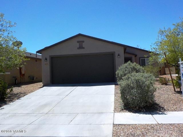 Rancho Valencia Pet Friendly Home close to DMAFB, shopping, dining and entertainment. Easy access to I-10. This charming 3 bedroom 2 bath home boasts custom tile throughout with carpet in bedrooms. Kitchen includes all black appliances, a long breakfast bar for plenty of seating and spacious pantry. Open, airy floor plan with a 2 car garage and upgraded light fixtures throughout. Laundry room with garage access includes both washer and dryer. Neutral paint colors throughout give the home a warm feel. Landscaped backyard with covered patio, mature trees and artificial turf. Please call to schedule a viewing!