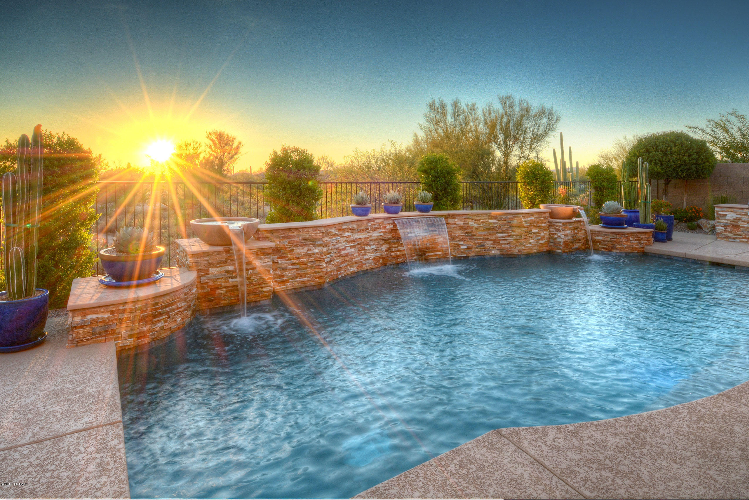 *DESERT ELEGANCE* WONDERFUL SW CONTEMP DESIGN W/ELEGANT POTTERY BARN FLAVOR & FEEL!TASTEFULLY DECORATED! BACKYARD PARADISE!FABULOUS POOL W/NATURAL ROCK ACCENTS,WATER SPILLS,EXQUISITE LANDSP BUFFERS DESERT PRESERVE FOR TOTAL PRIVACY! ENJOY TUCSON'S OUTDOOR LIVING AT ITS BEST- HUGE COVD PATIO, ALFRESCO COOKING-BBQ, COZY FIREPIT FOR CHILLY NIGHTS- RESORT LIVING AT HOME!ENTER WELCOMING COURTYARD- TO PICTURE PERFECT HOME! GATHERING ROOM IS THE HIGHLIGHT OF KITCHEN/LIVING AREA- SOARING CEILING, GAS FP, TONS OF WINDOWS,QUALITY KIT-CHERRY CAB,UPGRADED APPLIC, 20X20  TILE,LUSCIOUS CARMEL GRANITE,OVERSIZED ISLAND & BEAUTIFUL BKFAST AREA-ALL WITH SPECTACULAR VIEWS!
EXTRA BONUS ROOMS- OFFICE/LIBRARY, LIVING/FLEX-REC & GORGEOUS DINING RM!GUEST WING/FULL BATH,PLANTATION SHUTTERS,8FT DOORS,& EXTD 4FT GA THIS HOME IS TRULY A ONE OF A KIND...ESPECIALLY FOR THIS PRICE- HAS ALL THE UPGRADES AND FEEL OF A CUSTOM! DOVE MOUNTAIN HAS BECOME A VACATION DESTINATION...GOLF COURSES, RITZ CARLTON RESORT, GALLERY FITNESS/GOLF CLUB, TONS OF HIKING/BIKING/WALKING TRAILS,ACRES AND ACRES OF NATURAL DESERT TERRIAN, GREAT RESTURANTS AND NOW THE PREMIUM OUTLET SHOPS- THEY HAVE IT ALL! SEE UPGRADE LIST AND FLOORPLAN ATTACHED*