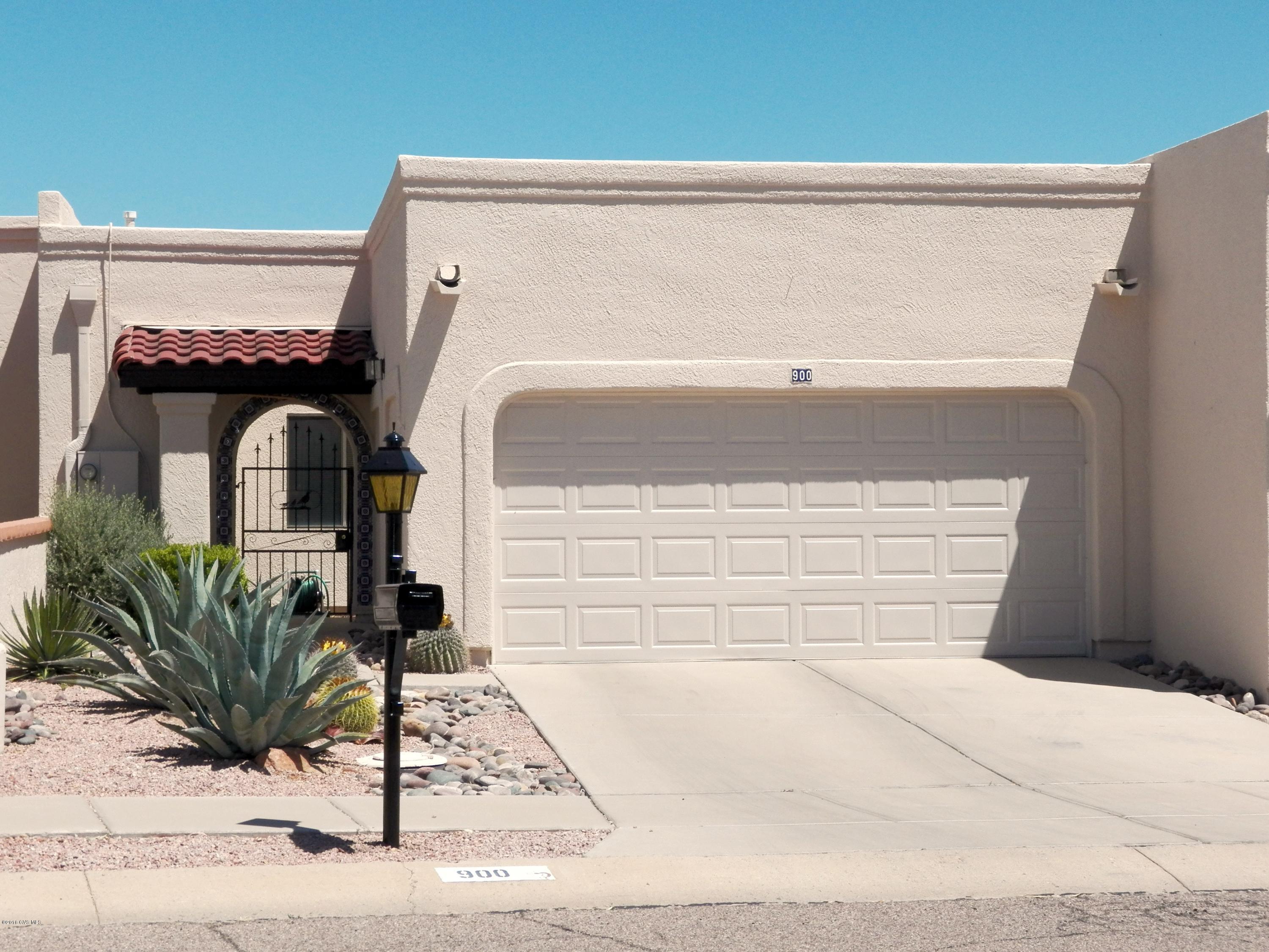 This well-maintained 2BR 2BA townhome features high ceilings, lots of tile except the BRs, no worries desert landscaping and walled rear yard bordering desert arroyo. The extended rear patio comes with a 10x10 freestanding canopy great for outdoor dining and entertaining. The breakfast nook faces the front courtyard. The exterior stucco was painted in April 2016 as part of the HOA coverage. A termite warranty and HVAC service contract are in place. New water softener Oct 2015. Conveniently located near GV Recreation pool.