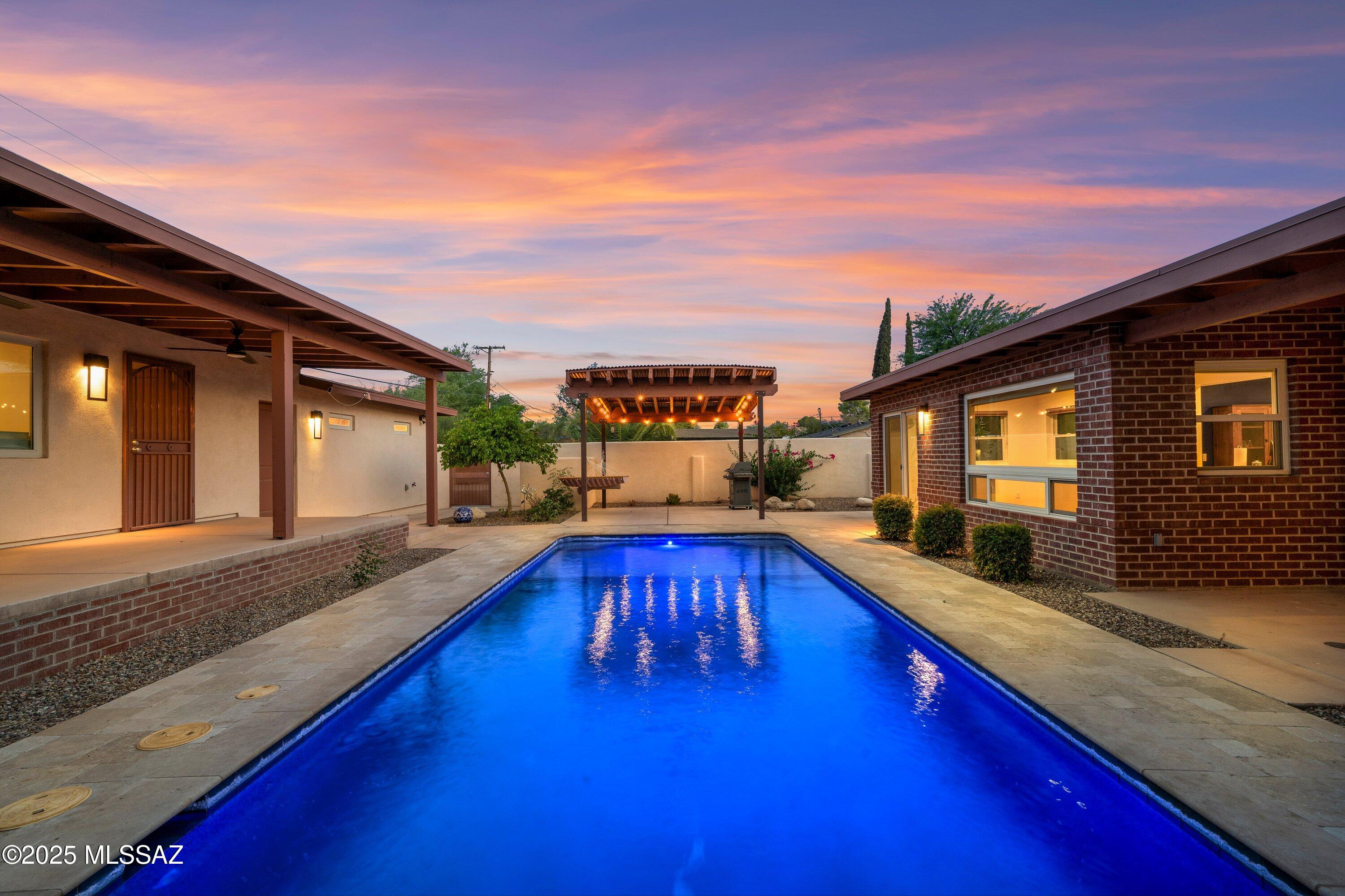 This move-in-ready home, plus full guest casita, and 2 car garage is located in the beautiful Catalina Vista Subdivision and is everything you could want and more! Walking into the main house, you are greeted with an open concept floor plan and tons of natural light. The kitchen is spacious and offers a breakfast bar, tons of storage, and will make entertaining a dream come true! Right off of the kitchen, you have room for a formal dining area, extra seating area or extra entertaining space! The Primary Bedroom is bright, generously sized and has multiple closet spaces. Inside you'll find a spa like bathroom with dual vanity, walk in shower, and access to an extra storage room. With that, you have two guest bedrooms that provide ample space for the family! Walking outside, you are greeted with your own personal and private oasis, with multiple opportunities for relaxation. Whether that's taking a dip in your sparkling pool, or just taking in the sound of nature underneath your covered gazebo. Both great for early mornings, or evenings with loved ones any time of year! The guest casita is a breath of fresh air, provides a truly open concept floor plan with a walk - in pantry, washer & dryer and the bedroom can fit a king-size bed! Perfect for your out-of-town guest, college students or possible rental. Truly the possibilities are endless! And with a location you cannot beat, we have all of your wants and needs covered, especially with the attached 2 car garage! This home has storage galore, was tastefully remodeled in 2019, and we mean it when we say you won't want to miss out on the amazing opportunity! Welcome home!!