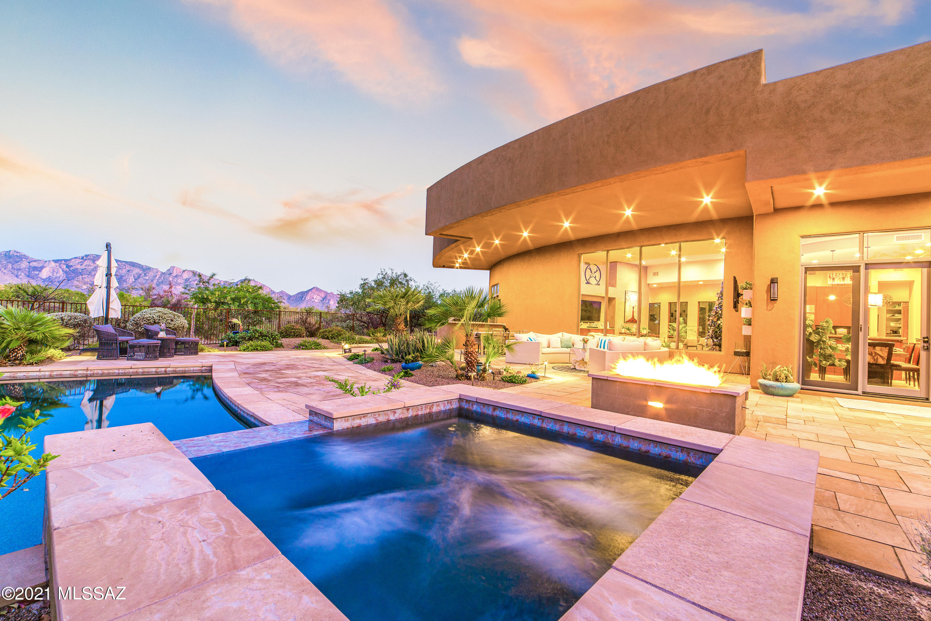 Range market pricing. Seller will counter or accept offers between $1,999,999-$2,300,000. Perfect balance of luxury & nature in this timeless contemporary home. Located in the world renowned private Stone Canyon Golf Club. Adjacent to Fairway 11 on a secluded cul-de-sac.  This elegant home is all single level w/ no steps. Open great room w/ floor to ceiling windows. Enjoy the tranquil desert setting w/ unobstructed mountain views. Polished stone & mesquite wood flooring throughout. Chef's kitchen w/ professional grade appliances. Primary suite has elegant appointed bath, fireplace & custom walk-in closet. All bedrooms have en-suite bathrooms. Gorgeous detached guest house w/ office, bedroom, bath & kitchenette. Resort like backyard is private with pebbletec pool & spa, firepit & BBQ area.
