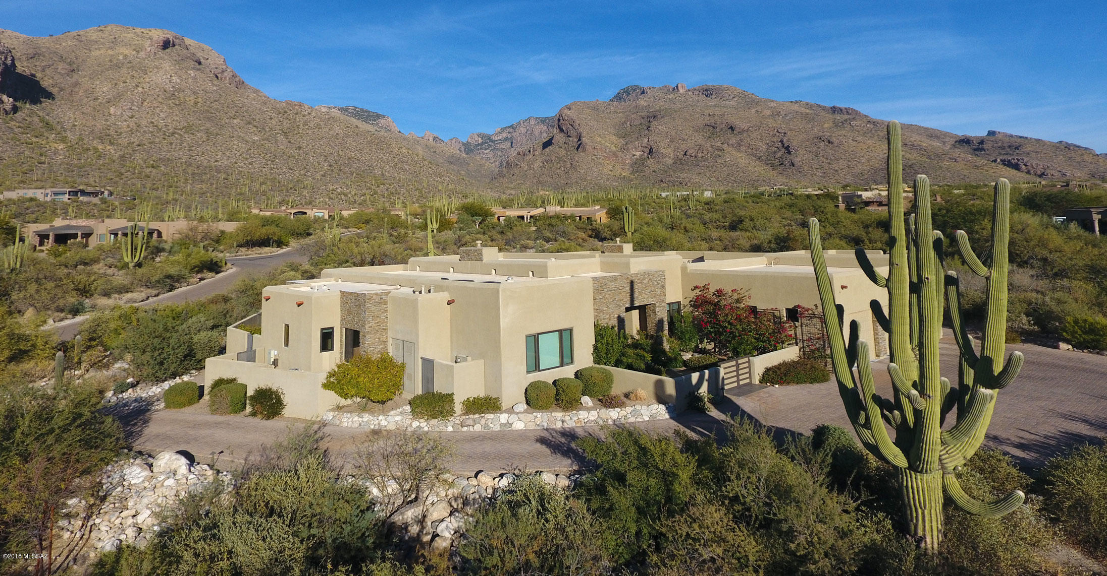 Situated for ultimate privacy with beautiful mountain and city views this stunning contemporary home custom built for current owners by Al LeCocq. All 4 bedrooms have on-suite baths , exercise room in master bathroom. 12ft ceilings in formal dining room and 10ft ceilings throughout rest of house. Strip gas fireplace in living room and great room.Gourmet kitchen with custom cabinets,and high end appliances, central vac, electronic blinds,California closets, solar panel heated pool, central humidifier,water softener and the list goes on. Pride in ownership is everywhere, house shows like a model. If you are a buyer who appreciates perfection this house is a MUST SEE.