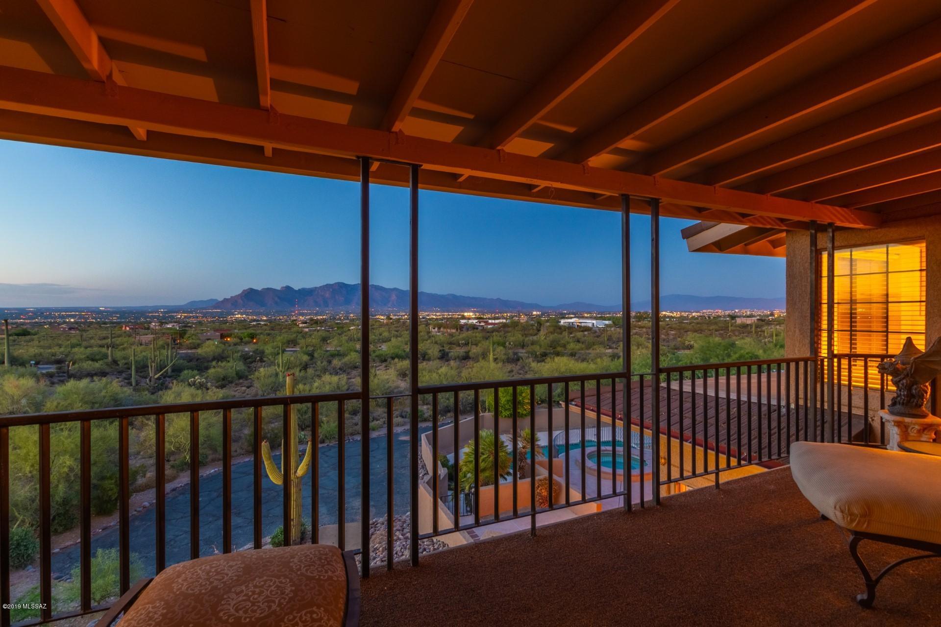Range Marketing: $525,000-550,000! VIEWS for Miles! They really don't make a view like this any more! Have quiet and tranquility on your own 3.5 acres and yet minutes from Downtown Tucson and the University of Arizona! This has 4 bedroom/ 2.5 baths, over 5000 sq ft, two living rooms, formal dining room, remodeled kitchen with Subzero Fridge/Freezer, Viking Dishwasher, GE Stove/Oven. Central Vacuum. AC is zoned by Carrier. Metal roof, Cathedral ceilings, pool and spa , two fireplaces (one in the Master bedroom), 2 car garage, Carport for your RV! There is a drone video under the picture tab! You can see the floor plan with pictures at http://www.floorplansfirst.com/plan_details.php?ID=10211&bk=bzrg