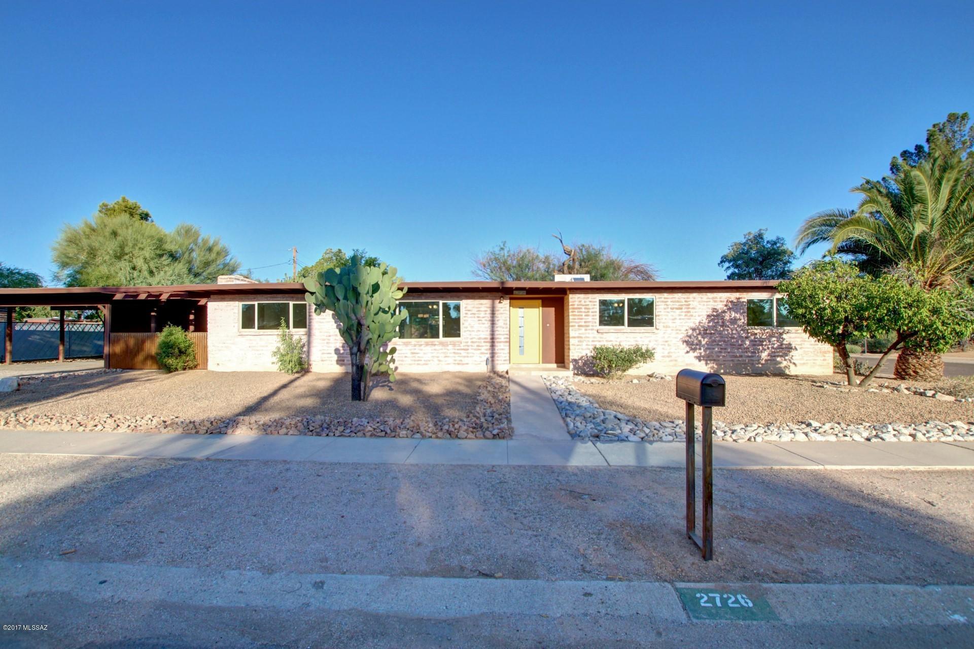 BEAUTIFULLY REMODELED BRICK HOME WITH AMAZING UPGRADES! TONS OF ROOM IN THIS KITCHEN - BRIGHT OPEN & WARM WITH GRANITE COUNTER TOPS, WHITE CABINETS, ALL STAINLESS STEEL APPLIANCES, MODERN LIGHTING. TONS OF STORAGE! BREAKFAST BAR AND EAT-IN KITCHEN. BEAUTIFUL STONE FLOORS WITH STONE BASEBOARDS THROUGHOUT WITH MATCHING FIREPLACE SURROUND AND KITCHEN COLUMN. COZY WOOD BURNING FIREPLACE IN HUGE LIVING AREA! BIG WINDOWS IN FRONT AND BACK ADD PLENTY OF NATURAL LIGHT. NEW CARPET AND CEILING FANS IN ALL BEDROOMS. MASTER BATH HAS LARGE BEAUTIFUL CUSTOM MARBLE SHOWER AND GRANITE COUNTERS IN BOTH BATHS. DUAL PANE WINDOWS. NEW HVAC AND NEW WATER HEATER. THIS HOME IS BEAUTIFUL AND MOVE IN READY!