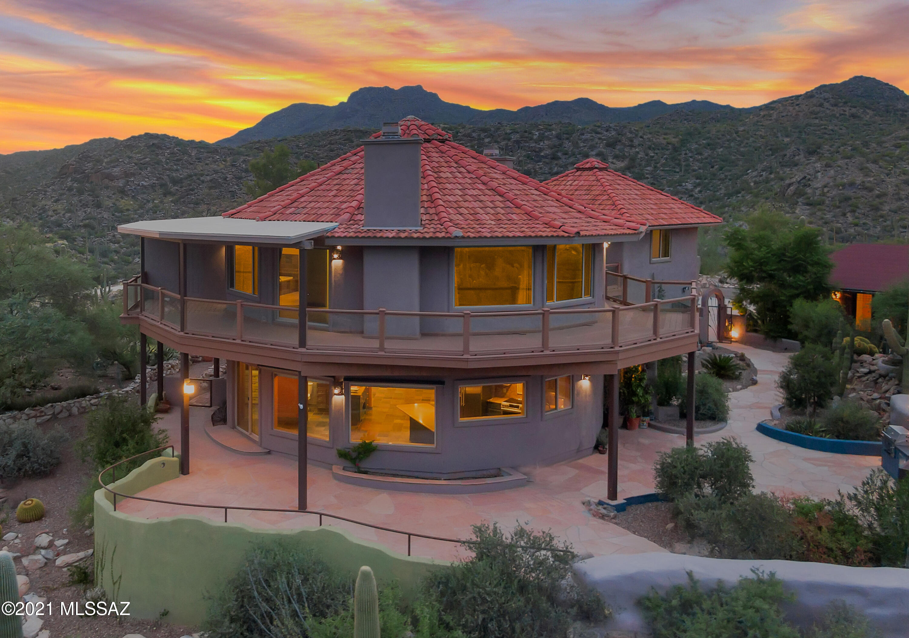 Nestled in the Tortolita foothills between Saguaro Ranch and Stone Canyon, with unobstructed 360 degree views of the Catalina mountains to the east and Tucson Mountains to the west sits this innovatively-designed and thoroughly upgraded one-of-a-kind Deltec home on 4.3 acres with a BRAND NEW WELL!! Entertain your friends in the chef's kitchen complete with a butler's pantry and wet bar. Enjoy breathtaking sunrises over the Santa Catalinas with your morning coffee on the wraparound porch, take in blazing sunsets on the gazebo with a backdrop of the saguaro-studded Tortolita Mountains. Stargaze on the astronomy deck or cozied up to the outdoor fireplace. 2 owner's suites!!