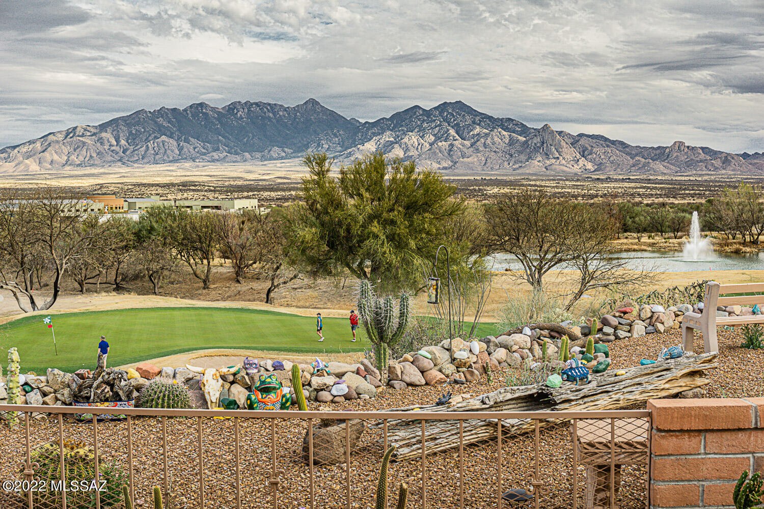 PANORAMIC -VIEWS! STUNNING EXTERIOR AND INTERIOR! Truly a must see 2543 sq.ft of open luxury inside on an elevated lot that gives you plenty of space and views of the golf course,valley and mountains. All rooms are generous sizes.  Wonderful and smart details- decorative glass front entry door, 2 side gas fireplace, ceiling fans, skylights,, wet bar, a kitchen that can accommodate a bunches of chef's, split bedrooms for privacy, great storage, central vac, utility sink in garage, gated entry courtyard, built in BBQ, make the back covered patio screened or wide open by just pushing a button!  SUPER LOVELY IN EVERY WAY!