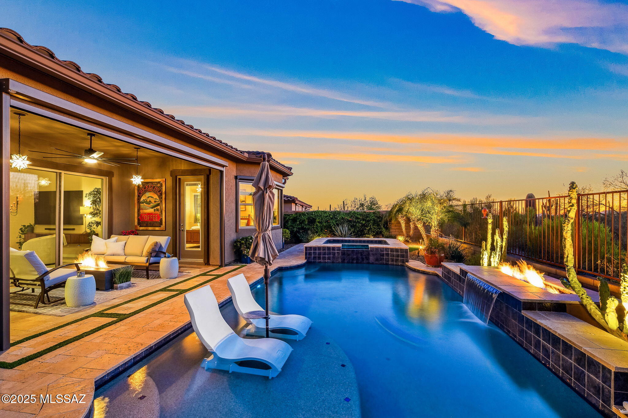Located on a prime lot backing up to the golf course, this beautifully designed 3 bed, 3 bath (plus office & den)home offers elevated living both inside and out. Enjoy beautiful Tortolita Mountain views and a stunning backyard oasis complete with a sparkling pool/spa and professional landscaping—perfect for relaxing or entertaining. Plus, the owned solar system keeps the high energy bills away. 
Inside, you'll find a chef's kitchen featuring ideal for culinary enthusiasts. The interior is immaculate, with tasteful design elements throughout that create a refined yet welcoming atmosphere.
This exceptional home combines elegance, comfort, and an unbeatable setting—truly a must-see!