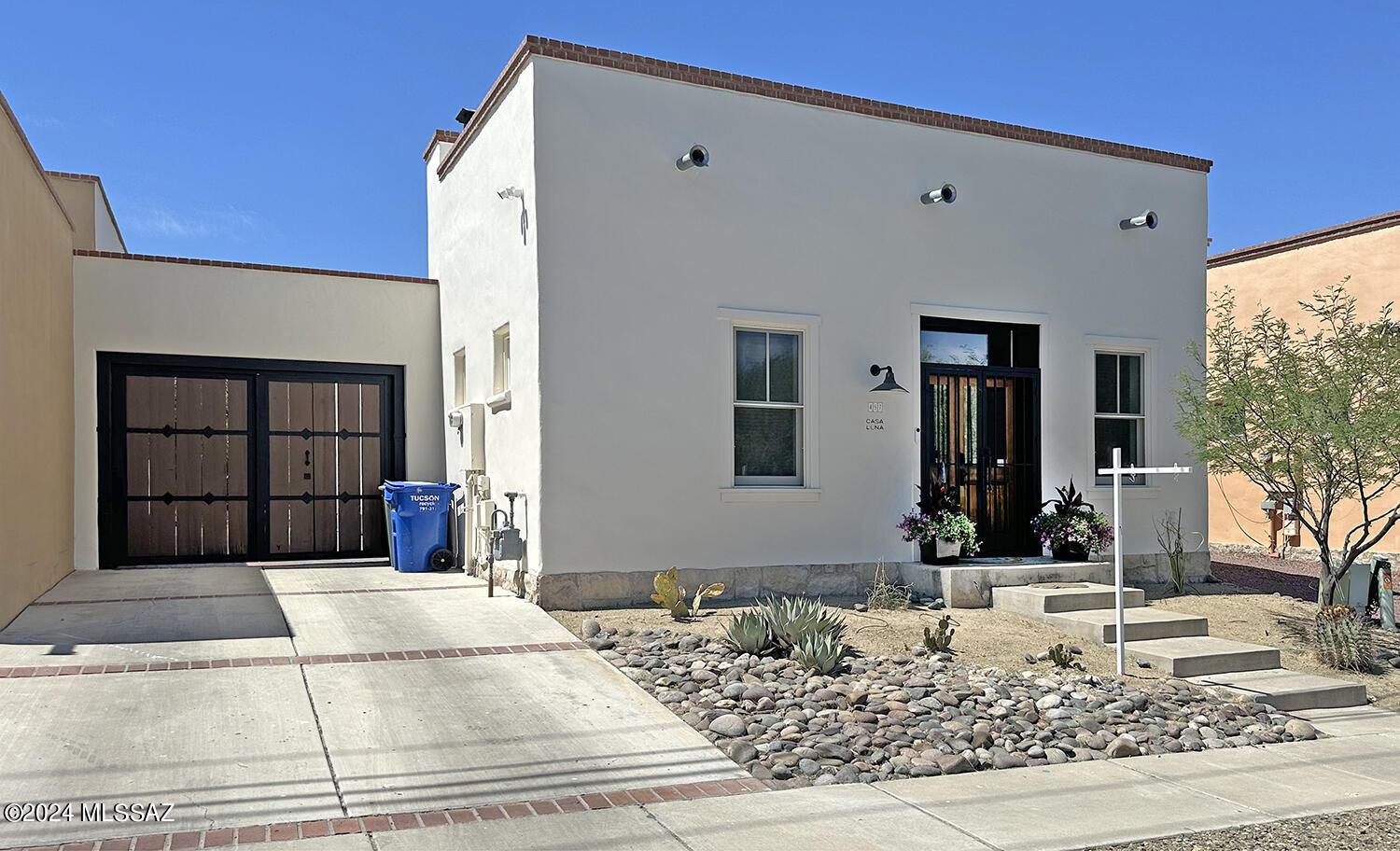 Welcome to Historic Barrio Viejo! Beautifully updated Barrio Hacienda style home includes detached Casita with full bath. From the living room you'll see a beehive fireplace, scored and polished concrete floors, high ceilings with fans, and custom french doors. Rain water harvesting and separate courtyards throughout the property for entertaining. Remote controlled gate opens to courtyards. Close to Street Car, St. Augustine Markets, and Congress. Newer HVAC and Water Heater.Newer Dishwasher. Floor Plan can be printed from the ''Document'' tab.