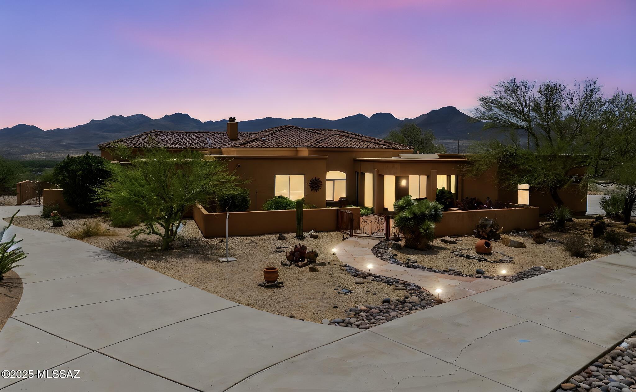 This is undoubtedly one of the most impressive properties in the entire county. This home offers everything you could wish for, extraordinary views, tranquility and privacy on a 7.5 acre lot, excellent construction quality, and of course massive space. 

The dimensions and floor plan of this home were carefully thought out to provide the perfect place to entertain guests or simply enjoy everyday life at home. Imagine your evenings enjoying a beverage at the comfort of your living room and feeling immersed in nature thanks to the expansive views from the oversized windows that give you the most impressive views you will find in Rio Rico, or relaxing and having fun a the pool with your friends and family while watching the famous colorful sunsets that Arizona offers. If you're looking for something truly special, this is the property for you. Every room in this home was carefully designed and most importantly built to last, built by one of the most renowned builders in the county you can be sure that quality was top priority in this home. This is a must see property, come and visit and don't miss out on the opportunity to own this beautiful house and make it your home.