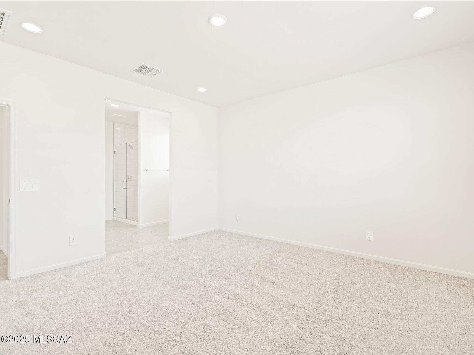 Rock Bottom Pricing. No finance incentives will be provided. This charming 3-bedroom, 2-bath home features an open-concept living area perfect for entertaining. The interior boasts crisp white cabinetry paired with white granite countertops, complemented by sleek grey tile flooring and cozy natural-tone carpet in the bedrooms.

Located in a gated community at the northeast corner of Broadway Blvd and Houghton Rd, you'll enjoy convenient access to major employment hubs, shopping, and dining—just 11 miles north of I-10.

Built with energy-efficient features, this home is designed to provide long-term savings, enhanced comfort, and peace of mind.