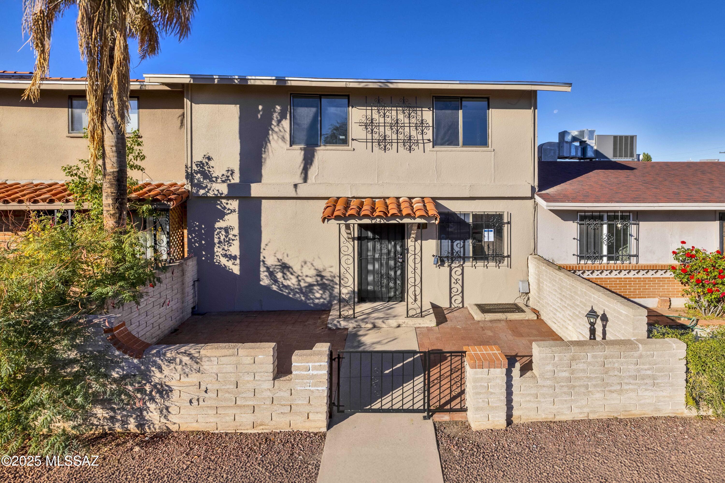 PRICE JUST REDUCED! Updated 4-bedroom, 2-bathroom TRI-LEVEL townhouse with 1,752 sq ft of living space, 2 carports and located in the Rolling Hills Villas Community on Tucson's Eastside. Recent repairs include freshly painted interior, NEW carpet, outlets, switches and NEW water heater. The finished basement features a spacious living area, full bathroom, and a large closet ideal for a primary suite, guest quarters, or a private retreat. The upper level offers three bedrooms and a full bathroom. The main level includes great room, updated kitchen, Arizona room, and a laundry, utility room. Move in ready! Contact agent for more information or to schedule a showing.
