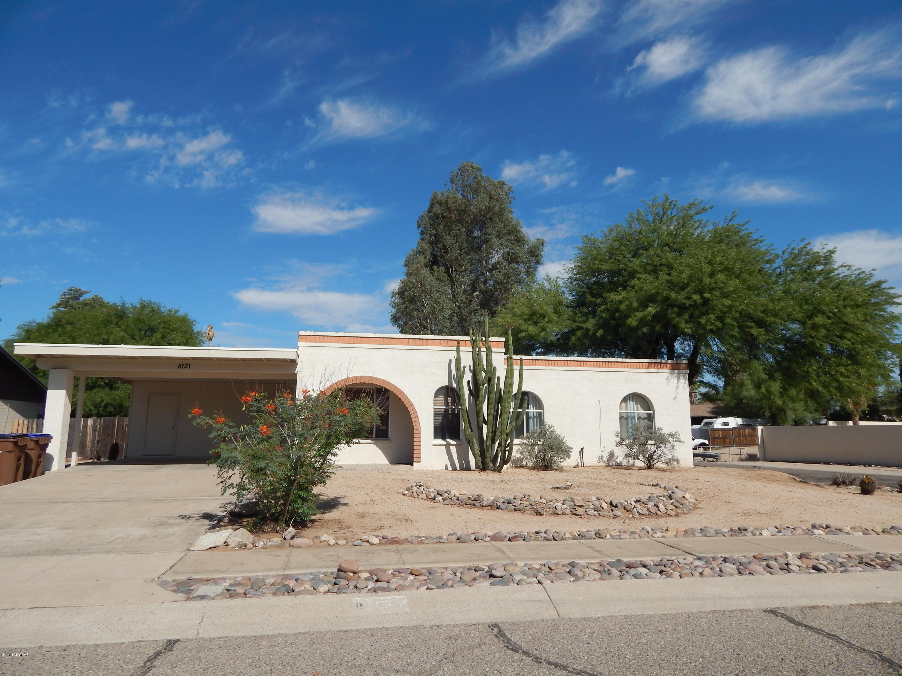 Great starter home. NEW AC-Electric Heat Pump installed 2018. Electric hot water heater in carport storage room.  3 bedrooms or 2 bedrooms PLUS den or office.  All ceramic tile floors.  Kitchen has lots of counter space and cabinets, built-in desk area.   Master bedroom can fit king bed.  Huge 200sqft  Storage Shed  with metal cabinet for shelving and upper storage too! Covered patio and nice size yard waiting for your green thumb.