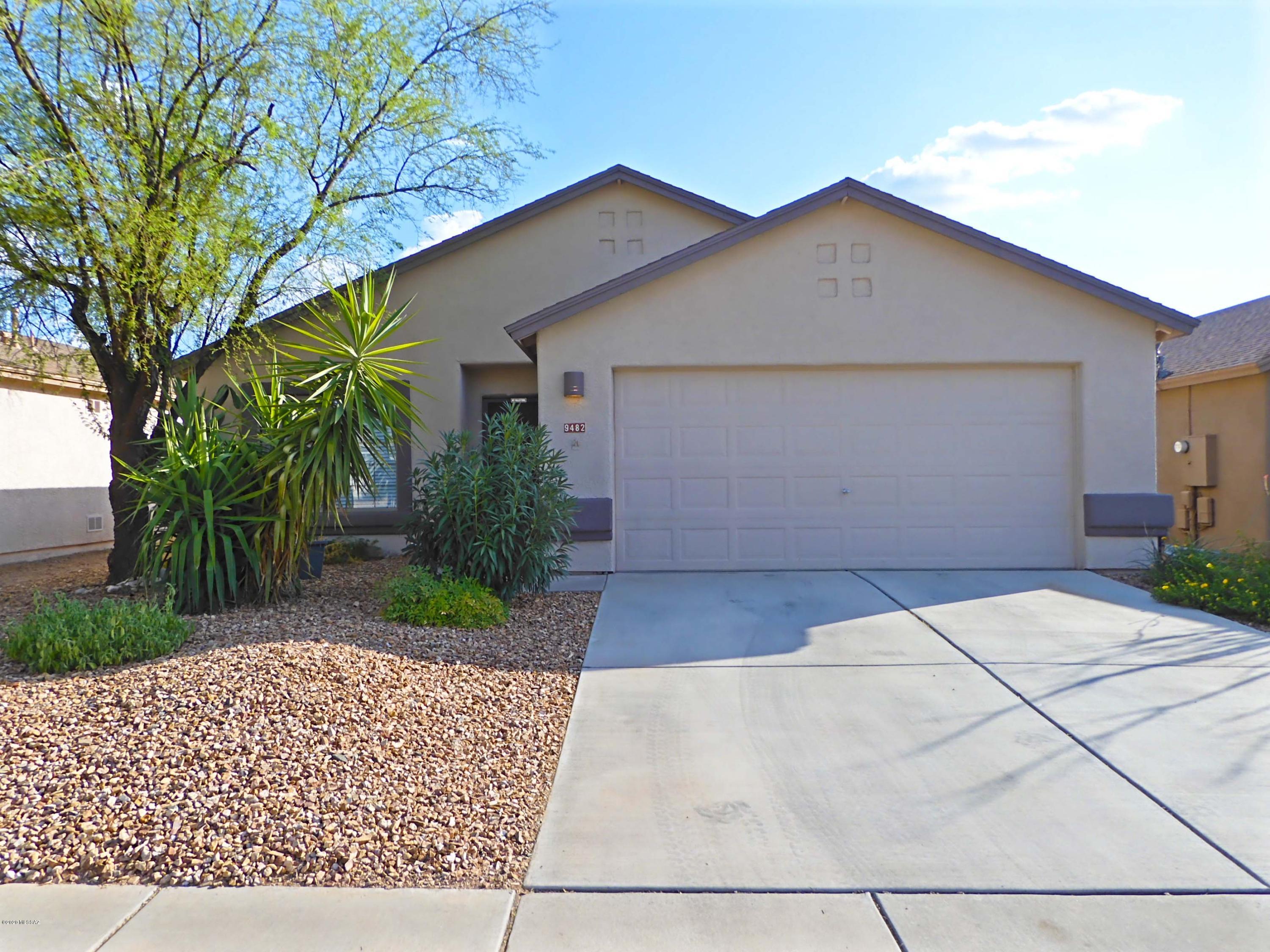 This cheerful & bright contemporary home features No Carpet, 3br/2ba, 2 living rooms, kitchen island, laundry room and a 2-car garage in desirable Rita Ranch. Kitchen with Built-in SS microwave, SS Dishwasher, SS Electric Oven/Stove, SS fridge & pantry. High ceilings throughout. Ceiling fans in all Rooms. Spacious Master Bedroom with Walk-in Closet, Built-in Closet System, double vanity, soak tub & separate shower. Covered patio & backyard w/ no neighbors behind. Vail Schools, close to Super Walmart, Fry's supermarket, quick access to freeway & close to major employers. Near popular Purple Heart Park (dog parks, skating park, public swimming pool, etc). 2 small pets Ok. This is a must see home for rent! Non Smoking Home. Renter's Insurance required.