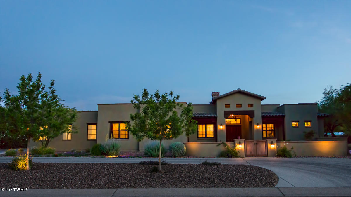 Custom home, first time on market, in prestigious Tucson Country Club. Best of both worlds with charm and elegance. Built in 2013. Front gated courtyard, antique entry doors, exquisite great room w/high ceiling, massive fireplace, wood plank floors,walls of windows.  Beautiful chandeliers, gourmet kitchen with oversized island, hand made cabinets, Carrara marble countertops, stainless steel appliances. 4 bedrooms, 4 bathrooms, study/office and media/bonus ROOM.5 sets of French doors open to the expansive patio. Resort size backyard, with fireplace, outdoor kitchen, BBQ, TV and privacy! It is not just a home it's a lifestyle with Tucson Country Club just around the corner, neighborhood block parties and 4th of July parades.Both owners are licensed to sell real estate in the State of Arizona