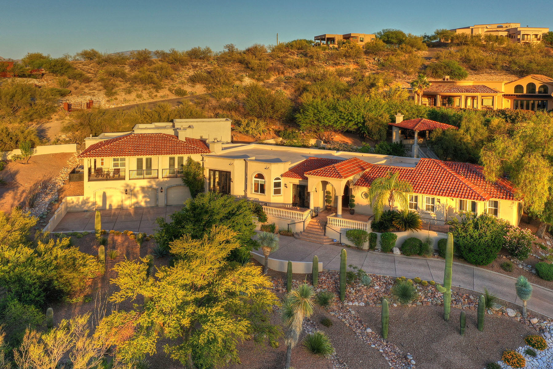 Stunning Catalina Mountain Views showcase this Private Estate located in the Prestigious Ventana Overlook.  On approach, the Dramatic Custom Iron Doors framed in Cantera will welcome you into the Grand Foyer and almost 7000 feet of a well appointed home.  Custom Features includes a Gourmet Kitchen boasting Dacor Double Ovens, 2 Dishwashers, Granite CT, Large Island & a 6 Burner Cooktop. Picturesque Windows & Doors designed to invite the outdoors in, a secluded Master Suite w/sitting area, 2 way fireplace & a Private Balcony.  Bonus Spaces include a Media Rm, Game Rm and Personal Gym to be enjoyed by all. Retreat to your Backyard Oasis with a Sparkling Pool & Spa, Putting Green, Gazebo with Spectacular Views of the Catalinas along with the Sunrise and Sunsets only found in the Desert!!