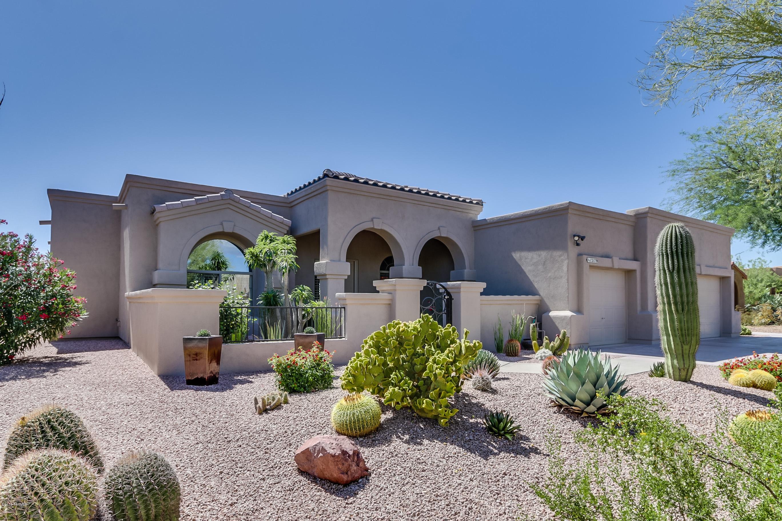 A wall of windows showcases incredible Tortolita & Tucson Mountain and sunset views from large view lot overlooking expansive wash. Designed and built by C&C Construction this fabulous home is light and bright...a perfect blend of casual and formal spaces. Special interior features include custom window treatments, trey ceiling in dining room, granite counters in kitchen, stainless appliances, maple cabinets, neutral decor. One is welcomed by a beautiful courtyard entry enhanced by lush desert garden and Catalina Mountain views. Spend many relaxing hours around the sculptured lawn and sparkling pool & covered patio or enjoying the night sky from extended patio. Warm and welcoming 12179 Tall Grass is a very special place to call home! You'll never want to leave!
