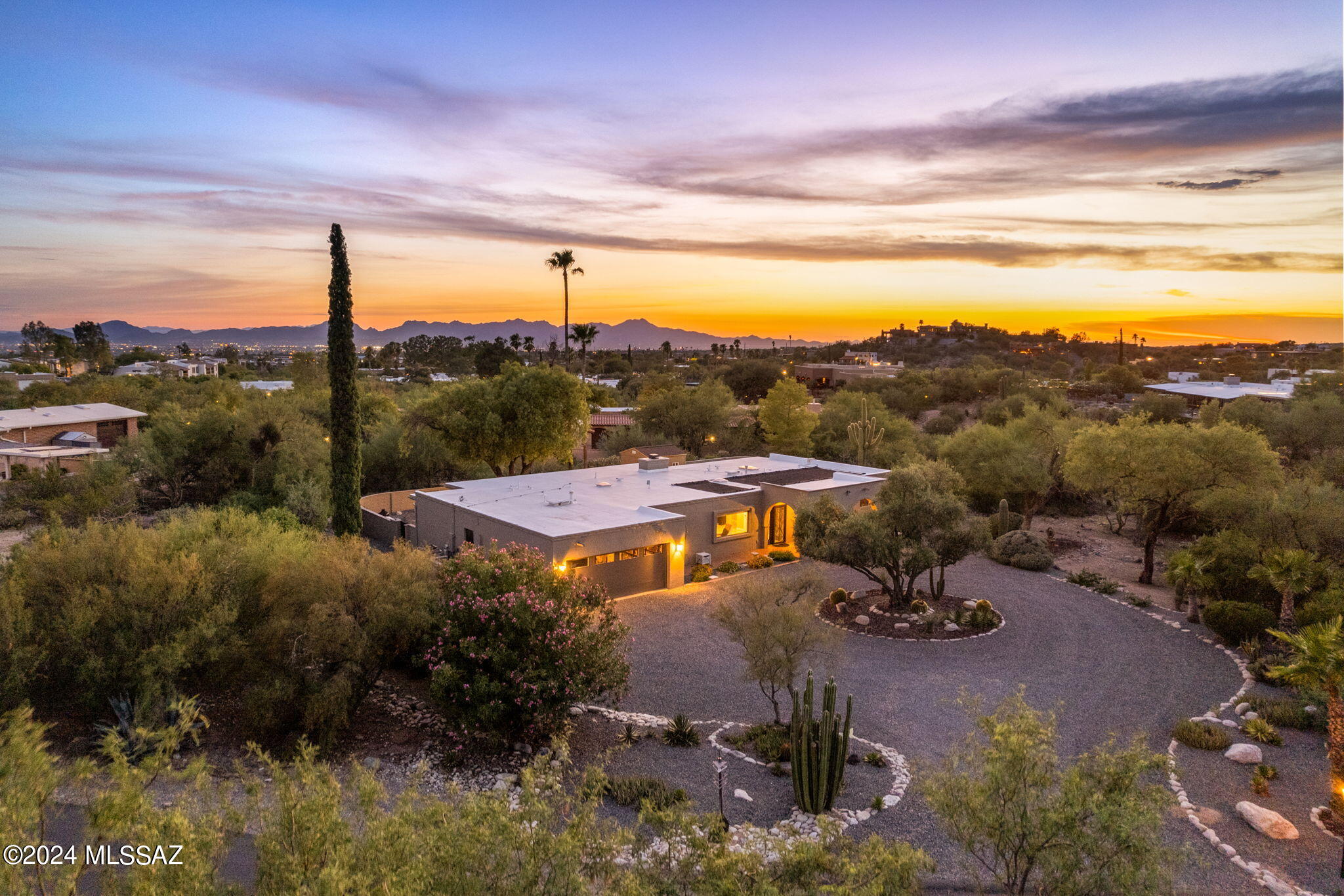 Gorgeous Skyline Bel Air Ranch Home with Mountain Views from Almost Every Window!

This stunningly remodeled residence boasts wonderful curb appeal and is situated on a beautifully landscaped premium lot. Designed and finished with meticulous attention to detail, this modern and luxurious home offers a split floor plan centered around a showpiece kitchen that opens to a family room featuring a custom stacked stone fireplace. Additionally, the home features both a spacious living room and a formal dining room, perfect for gatherings and entertaining.

The home includes an expansive primary suite, as well as a second primary suite, each with its own bathroom, offering comfort and privacy. The walled-in backyard is a true oasis, featuring a beautiful shade tree, a sparkling pool, and a large covered patio that invites you to enjoy the stunning Tucson weather.
Feel like being social? Check out the neighborhood amenities, including a huge lap pool, BBQ area, tennis court, and basketball court, providing plenty of opportunities for fun and relaxation.
This home is an exceptional find and is priced at market value. Call for a showing today!