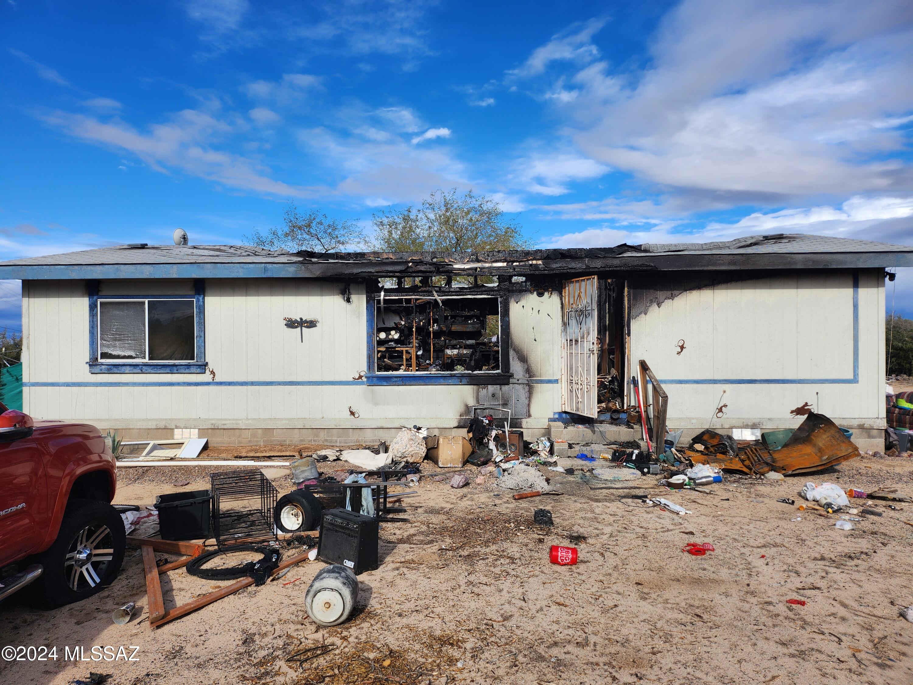 Manufactured home with significant damage.