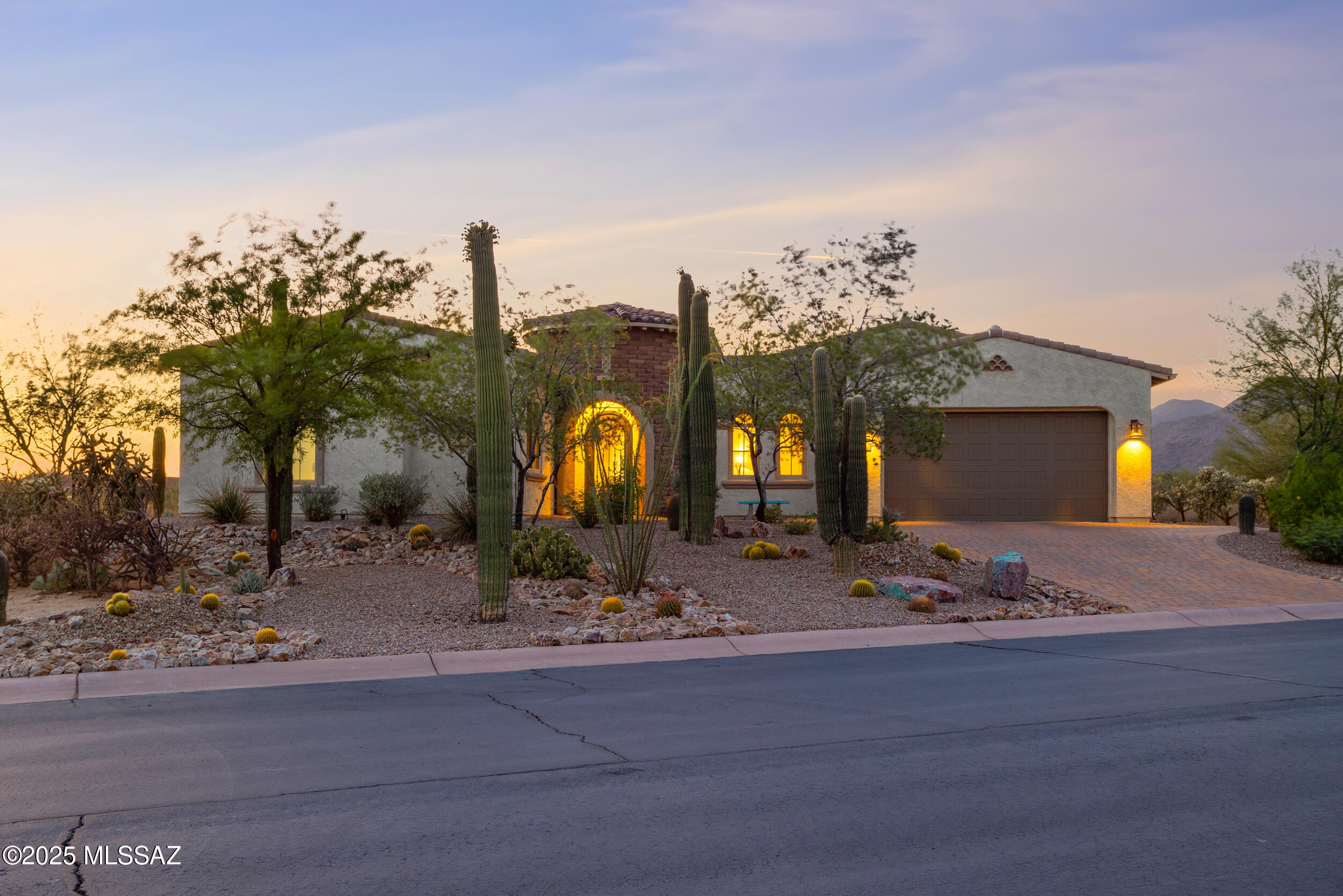 * DESERT GEM* STUNNING SW CONTEMP NESTLED .73 ACRE IN GATED ENCLAVE OF SEMI- CUSTOM HMS! FEEL THE SERENITY & PEACE IN THIS WELL APPOINTED ESTATE HOME. BORDERS NATURAL DESERT W/ MAJESTIC MTN VIEWS & LUSH SONORAN TERRIAN! TRUE RETREAT- BOASTS HUGE GATHERING RM-  GLASS WALL/SLIDER STACKS TO EMBRACE THE OUTDOORS...EVERY COOKS DREAM KIT- UPGRADED SS APPLIC, QUARTZ CTRS- HUGE WORK ISLAND  OPENS TO GREAT RM! POPULAR 4 BR FLRPLAN OFFERS SEVERAL WINGS- PRIMARY RETREAT, 2 BR GUEST WING, & ''NEXT GEN'' EN-SUITE BR QTRS INCLS OVERSIZED REC /LIVING SPACE... PLENTY OF RM FOR KITCHETTE - PERFECT FOR EXT'D FAMILY! TONS OF POTENTIAL!  UPGRADES GALORE-ORIGINAL OWNER!  ENJOY TUCSON OUTDOOR LIVING- LOTS OF HIKING/BIKING TRAILS, SHOPPING/RESTAURANTS, CLOSE TO DOVE MTN- RITZ CARLTON RESORT...FABULOUS LOCATION!