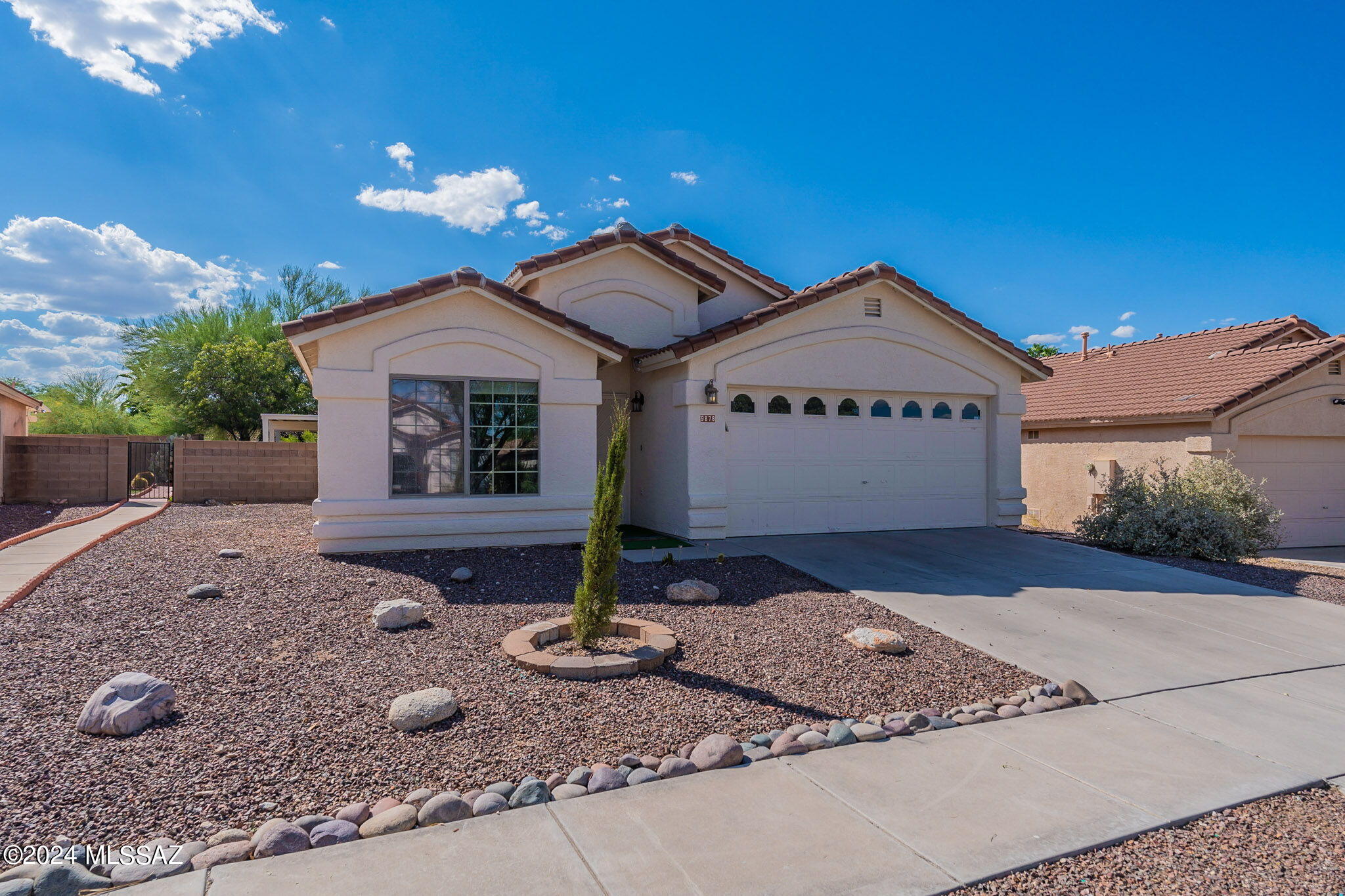 Welcome to this charming 3-bedroom, 2-bath home nestled in a quiet cul-de-sac! With 1,630 sq. ft. of open living space, this home offers a modern layout perfect for entertaining. The kitchen is equipped w/new appliances, including a gas oven, refrigerator, dishwasher, microwave, & a washer/dryer set, all just 2 years old. The bathrooms boast granite countertops with shower/tub in hall bath. The primary suite features a large walk-in closet & a stylish bathroom with double vanity, separate shower, and a soaking tub for ultimate relaxation. Enjoy outdoor living with covered patio, artificial turf, & a personal putting green, surrounded by mature trees offering both shade and privacy.  New luxury vinyl flooring throughout. 2 car garage & stunning mountain views complete this must see home!