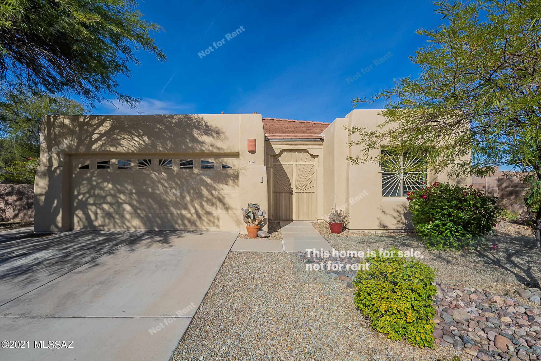 Mountain views! Stunning Catalina home with private pool! Large open flloor plan with wood like tile flooring. Kitchen has gorgeous wood cabinets with a farm style sink! Living room has built ins and plenty of space for entertainment. Master bedroom has a private ensuite with a separate soaking tub and shower. Schedule a showing today!