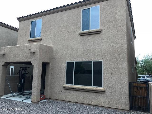 Simply a beautiful home with all tile flooring throughout the main living areas. The kitchen is stunning that opens to the dining area! There is lots of windows throughout to enjoy the natural sunlight. The loft upstairs is the perfect spot for an office or extra living space. You will fall in love with everything this home has to offer. The back yard has lovely desert landscape and its easy care maintenance.  The front yard maintenance is included along with the trash pickup.  In the summer relax and cool off at the community pool. The refrigerator, washer, and dryer are included with this home. This home can be rented for 18 months.