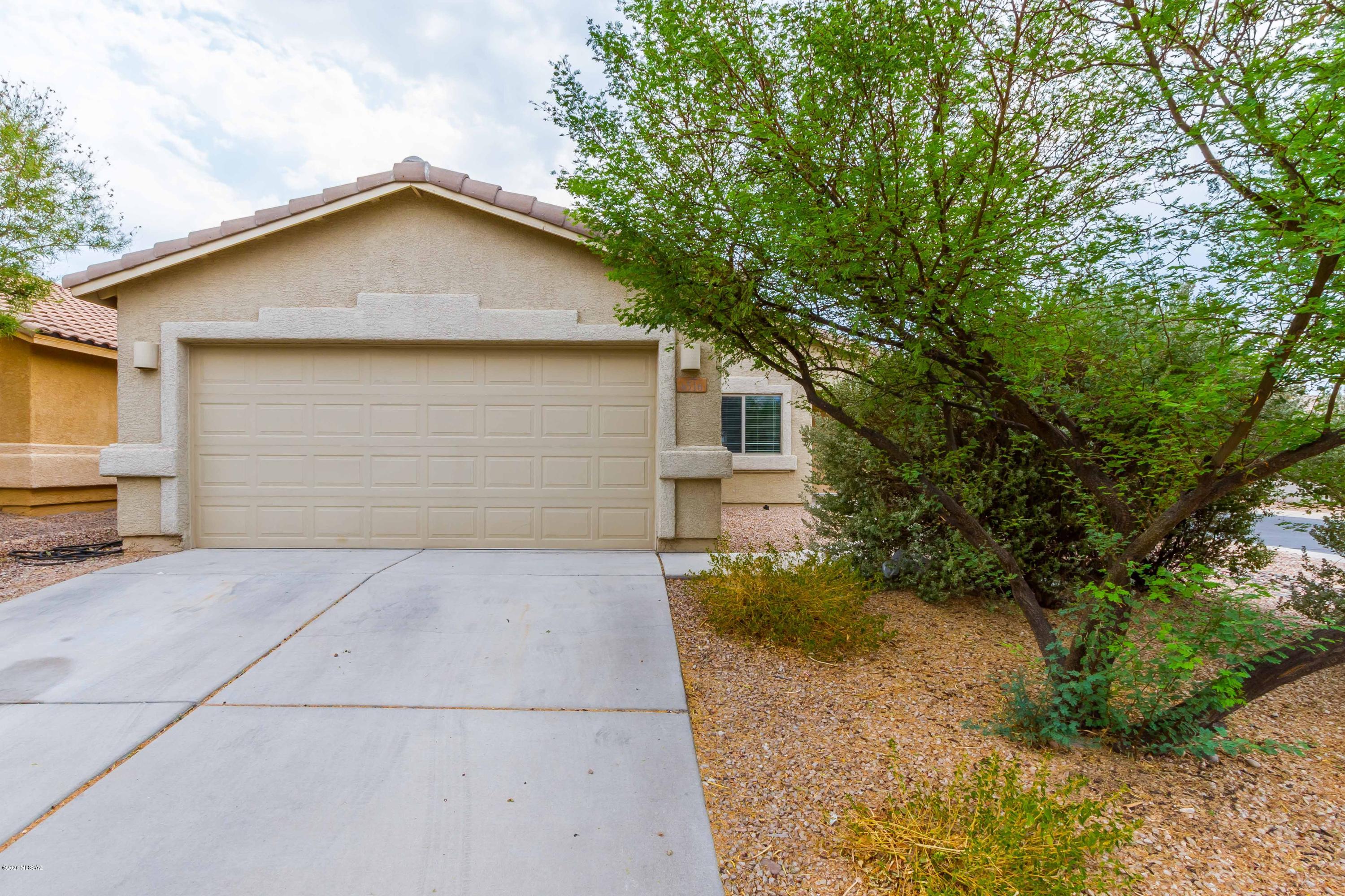 Well-maintained home on large corner lot located within award winning Vail Unified School District!