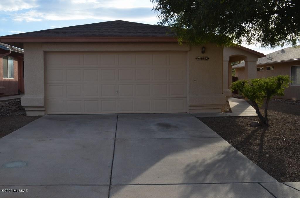 Lots of new here!  3 bedroom, 2 bath with great room/dining, tiled throughout  slate carpet(installed 2018) in bedrooms, brand new sinks and fixtures in bathrooms, refrigerator, stove and dishwasher new 2018, new ceiling fans and light fixtures 2018, Blinds new 2018, fresh paint interior and full exterior paint 2020. Brand new roof 2020.  This home backs up to a common area and has a covered patio, A/C installed 2015.