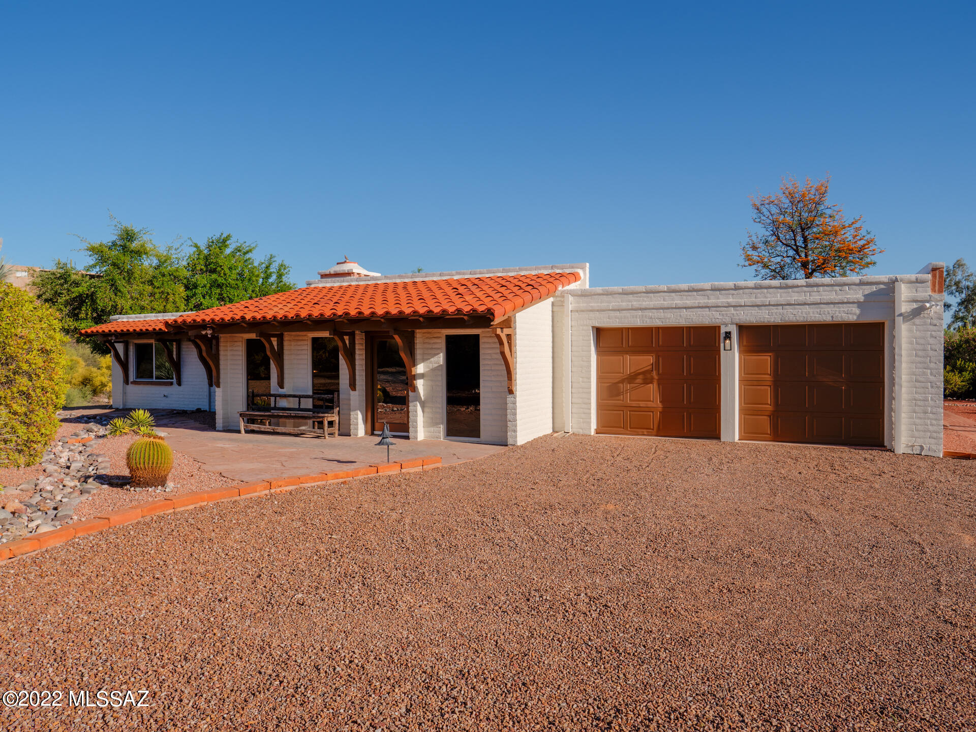 West coast design meets the Tucson desert. This luxe Devall Design Home is a 3 bedroom, 2 bath, sanctuary where Tucson living intersects with style and sophistication. Fitted with a new Chef's kitchen with premium stainless steel appliances, beautifully coordinated granite and quartz countertops. Primary and shared baths feature Delta Trinsic fixtures, hand chosen lighting and stunning Travertine tile work. An amazing covered back courtyard anchors the outdoor living space that leads to the inviting replastered pool. This special home has been designed and curated by Devall. Find her at www.devalldesignhome.com