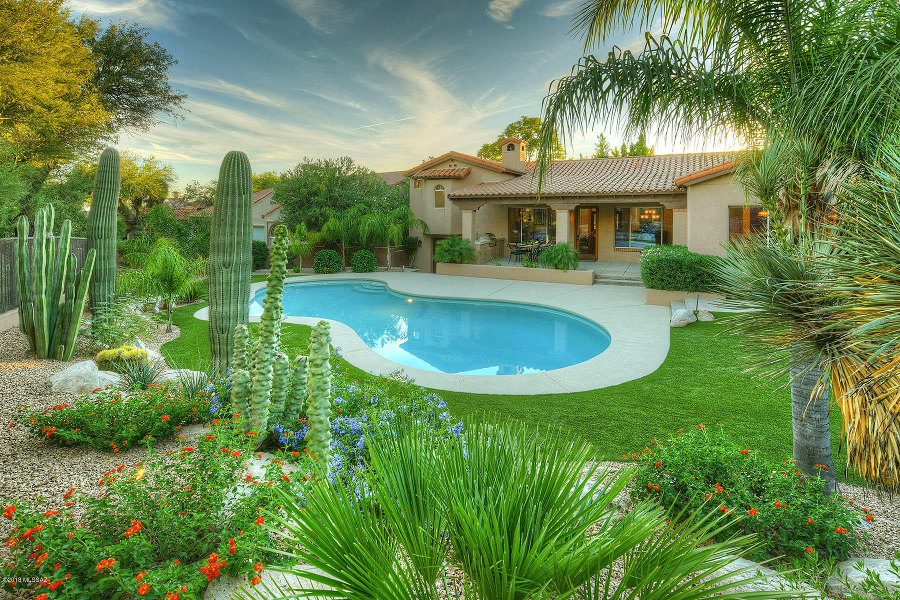 GRACIOUS & ELEGANT HOME LOCATED  ON THE WORLD RENOWNED GOLF COURSE AT VENTANA CANYON COUNTRY CLUB.  MAJESTIC MOUNTAIN VIEWS,  LOVELY COURTYARD ENTRY, BEAUTIFUL  & EXTENSIVELY  REMODELED THRU OUT,   EXQUISITE  LIVING RM &  DINING RM W/ HIGH CEILINGS , LG PICTURE WINDOWS, DRAMATIC  STONE FIREPLACE, GOURMET ISLAND KITCHEN W/ GRANITE COUNTERTOPS, STAINLESS STEEL APPLIANCES, GAS STOVE TOP, BREAKFAST AREA, FAMILY ROOM , GORGEOUS 24 '' TRAVERTINE TILE FLRS & FRENCH DRS, 3 BR'S +  STUDY W/ WOOD FLRS (OR 4 BDR'S) , 3 BA'S INCLUDING MSTR W/SITTING AREA, LUX.BATH W/BLACK GRANITE COUNTERTOPS, CLAW FOOT TUB, LG SHOWER, 2 WALK IN CLOSETS & OUTDOOR DECK . RESORT LIKE EXTRA LARGE BKYD W/ POOL, GRASS, COV'D PATIO, BBQ, DIST.16 SCHOOLS, GOLF COURSE & MTN  VIEWS. FLR PLN  UNDER PHOTOS/VIRTUAL TOUR.