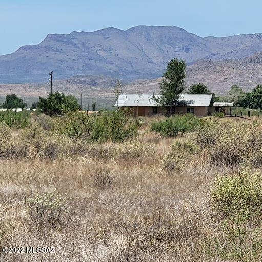 45 Acres only 10 minutes from I-10 off Fort Grant Rd.   Old farm with 2 old Irrigation wells.   one well has 2 phase power with meter.   Other irrigation well has 3 phase power with working current meter.  House has it's own meter.     House is a major fix up .   Photos in the details.   Private 45 acres with lots of possibilities.   All your utilities are on property .  Would make a great horse property. Property is zoned 1 house / acre   TR36