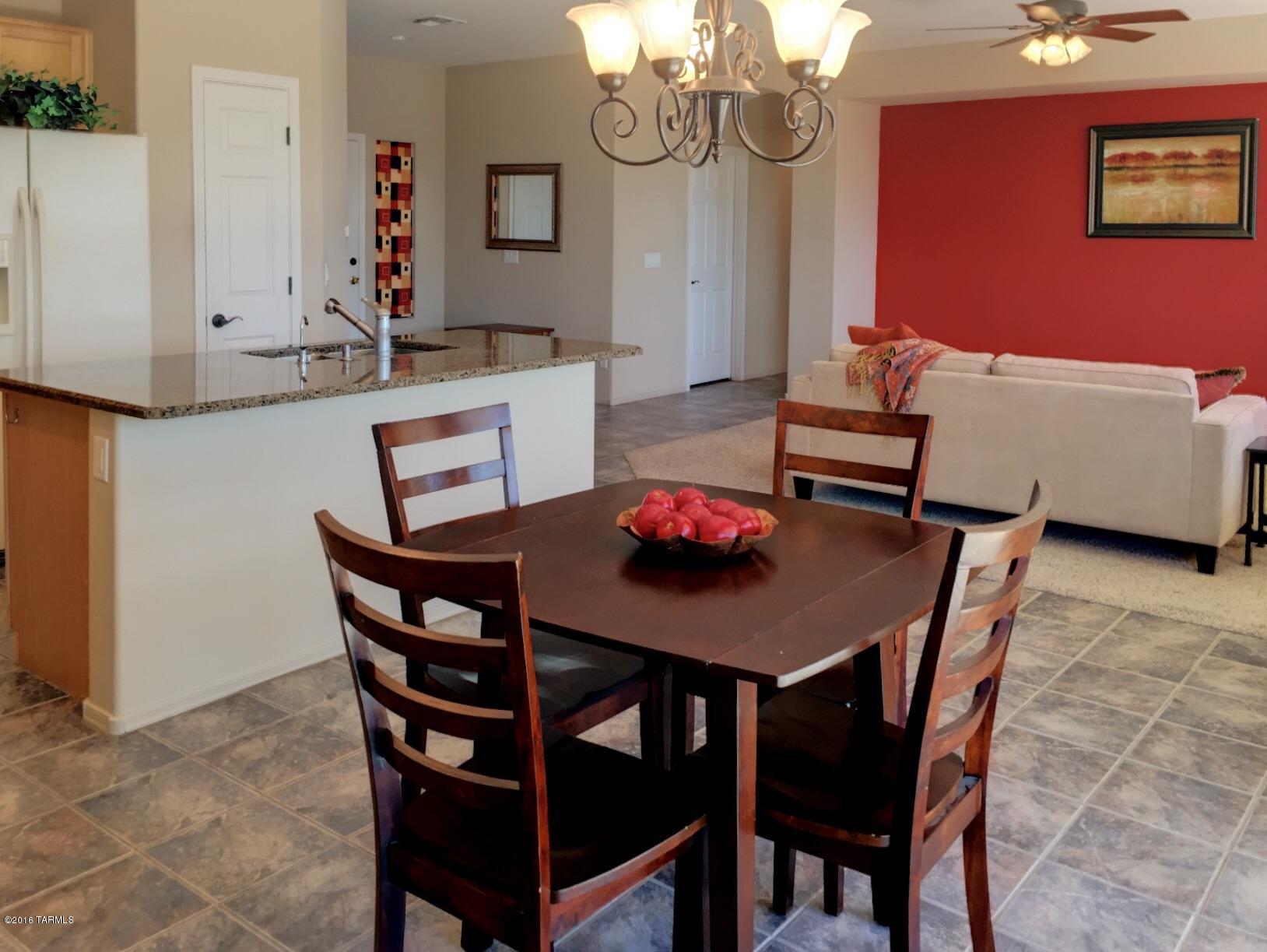 Privacy abounds in this open and airy 4 bedroom, 2 bath home in Mesquite Ranch. Located on private lot with no neighbors on 3 sides and an extended driveway. Great room floor plan opens out to the spacious backyard and full length porch, perfect for indoor outdoor living. Master bedroom is split from bedrooms 2-4.  4th bedroom has a private entrance and walk-in closet.